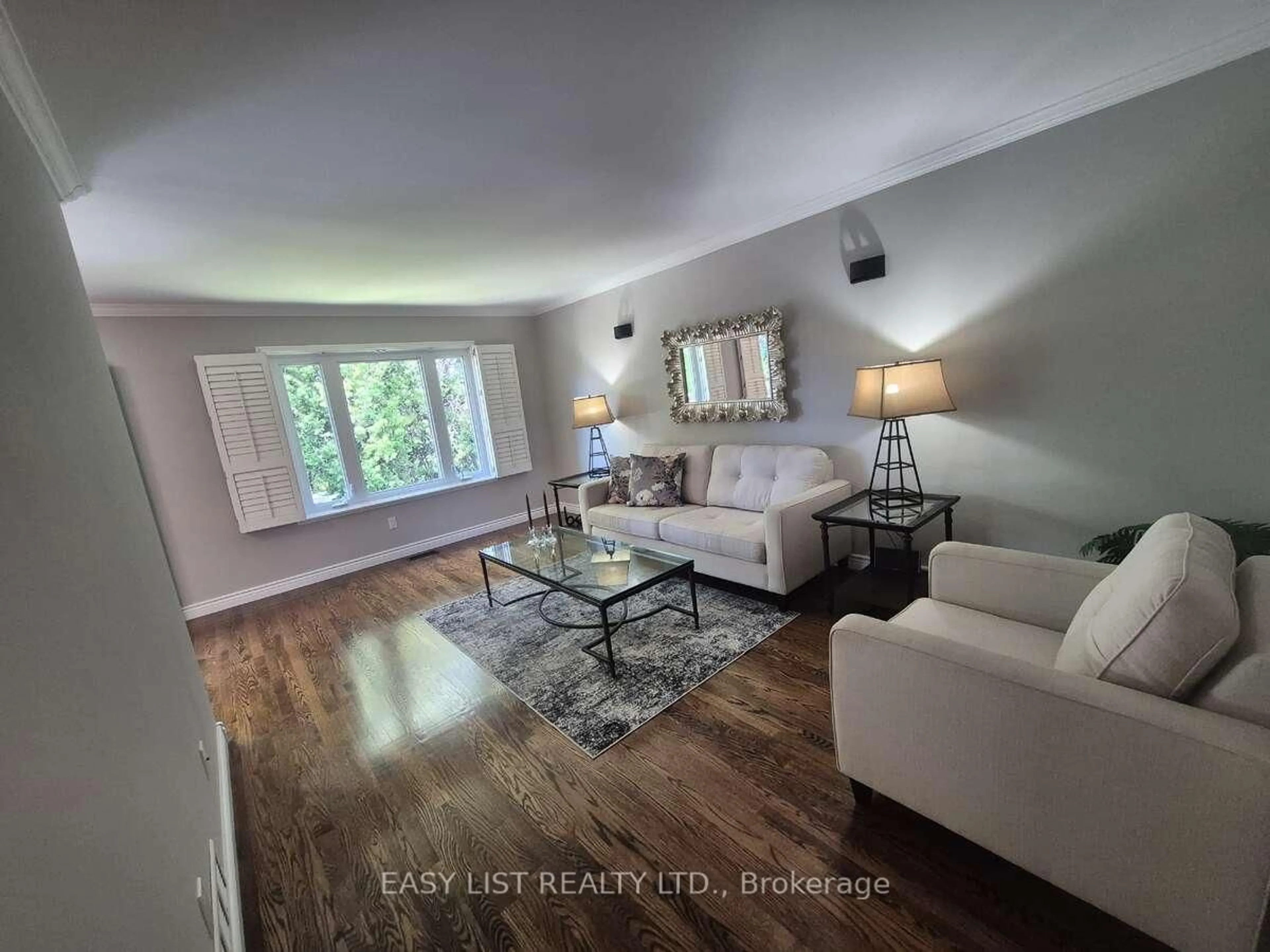 Living room with furniture, wood/laminate floor for 51 Lyndale Cres, Clarington Ontario L1E 1W6