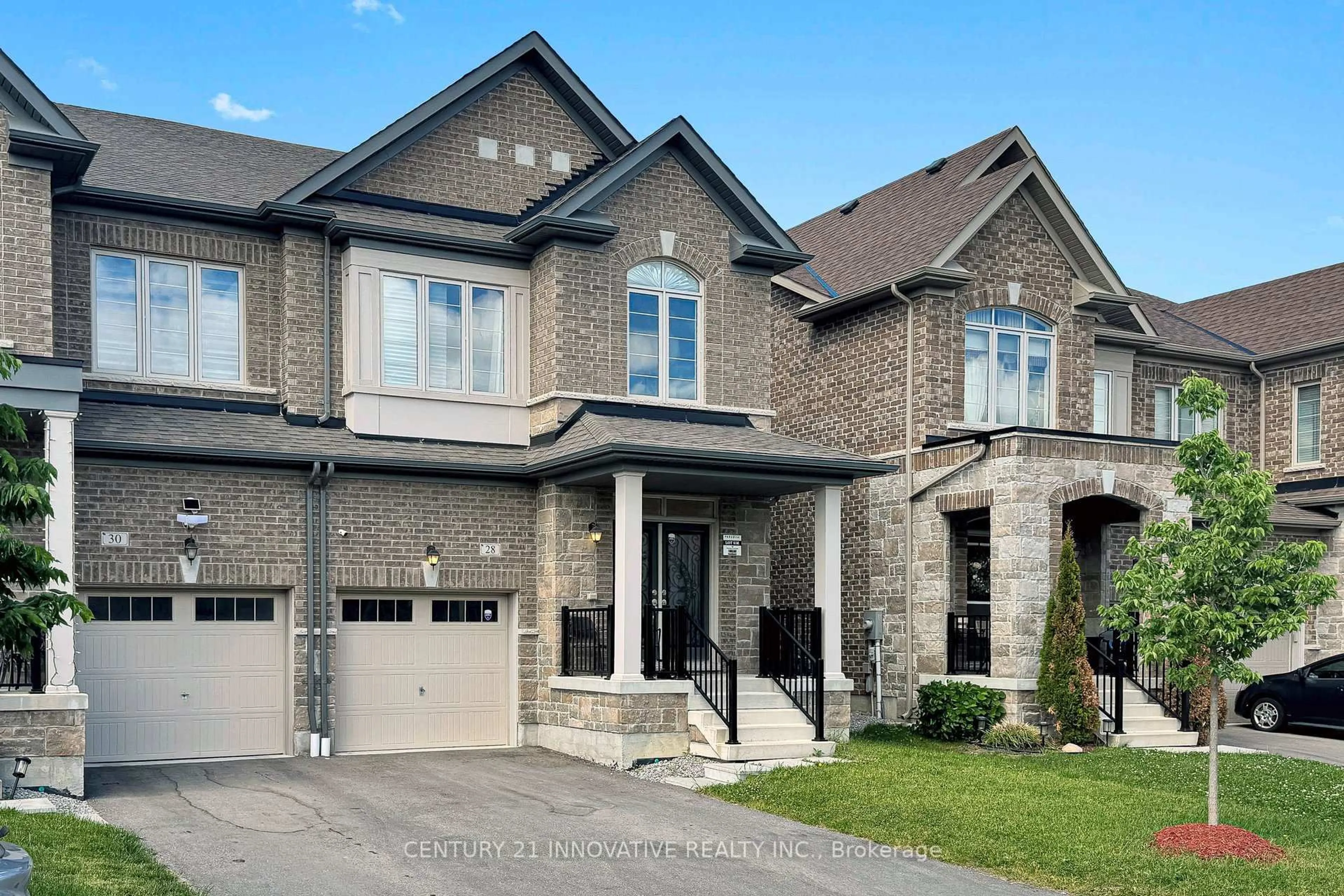 Home with brick exterior material, street for 28 Conarty Cres, Whitby Ontario L1P 0L4