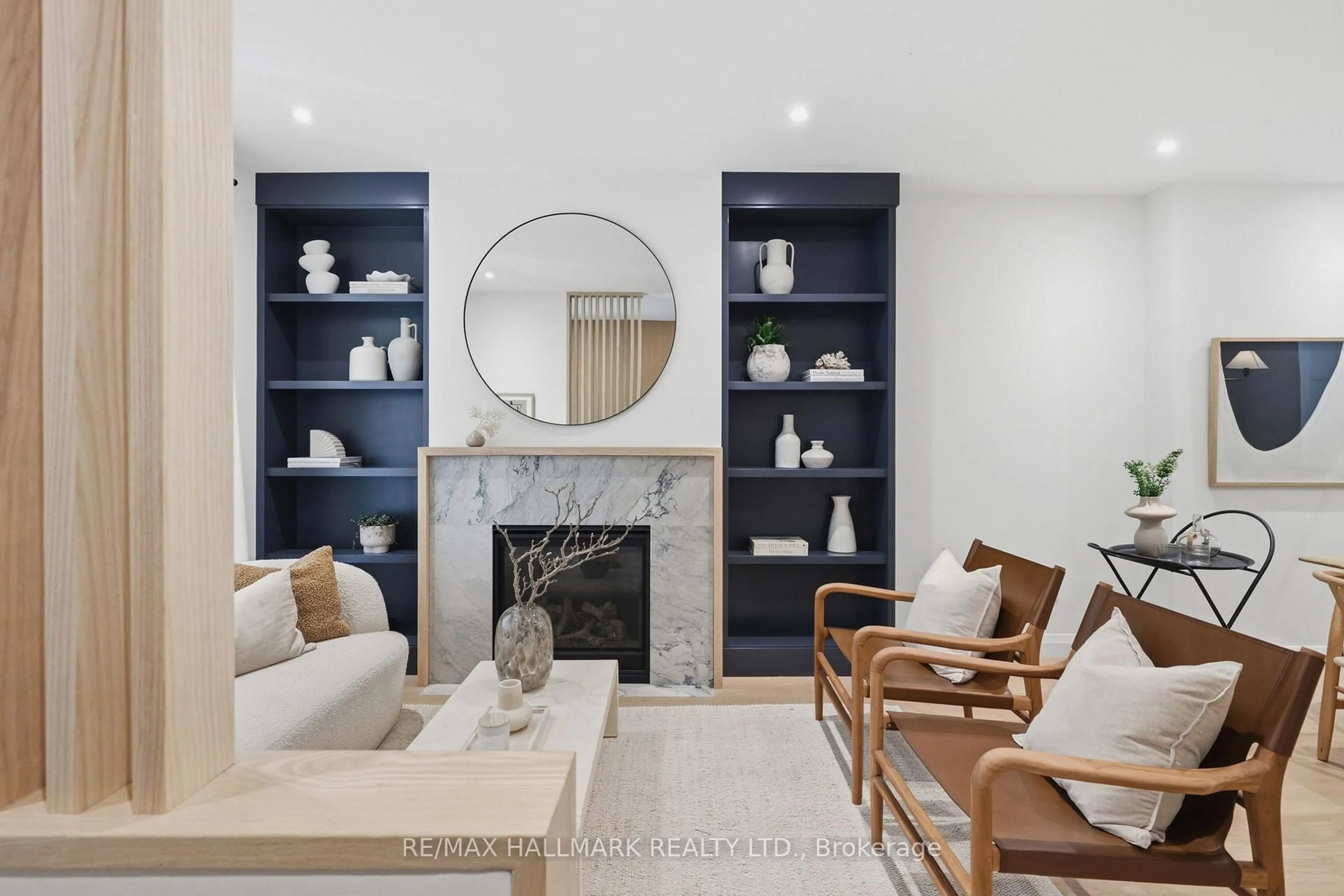 Living room with furniture, ceramic/tile floor for 32 Howland Rd, Toronto Ontario M4K 2Z6