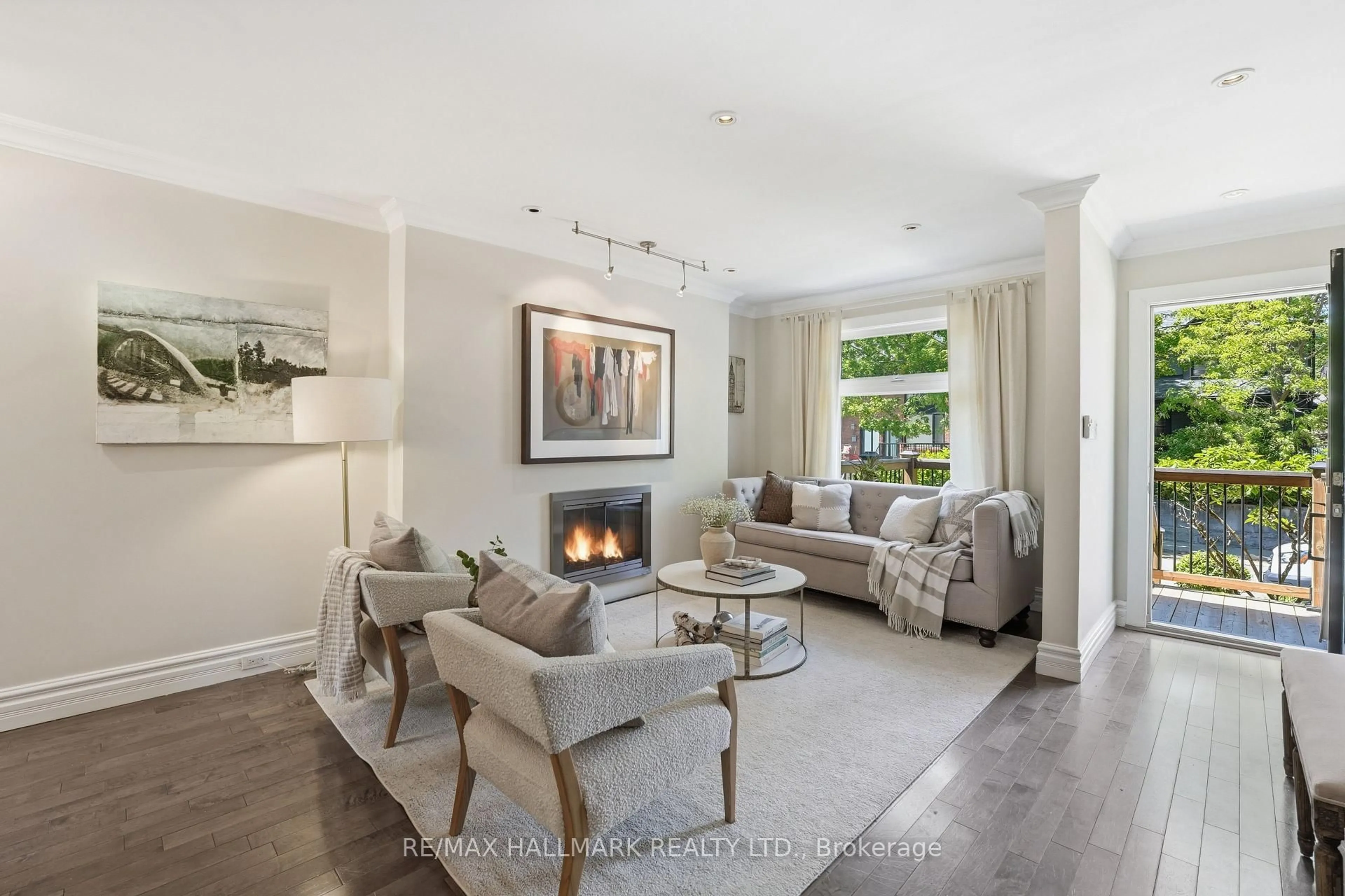 Living room with furniture, unknown for 105 Bertmount Ave, Toronto Ontario M4M 2X8
