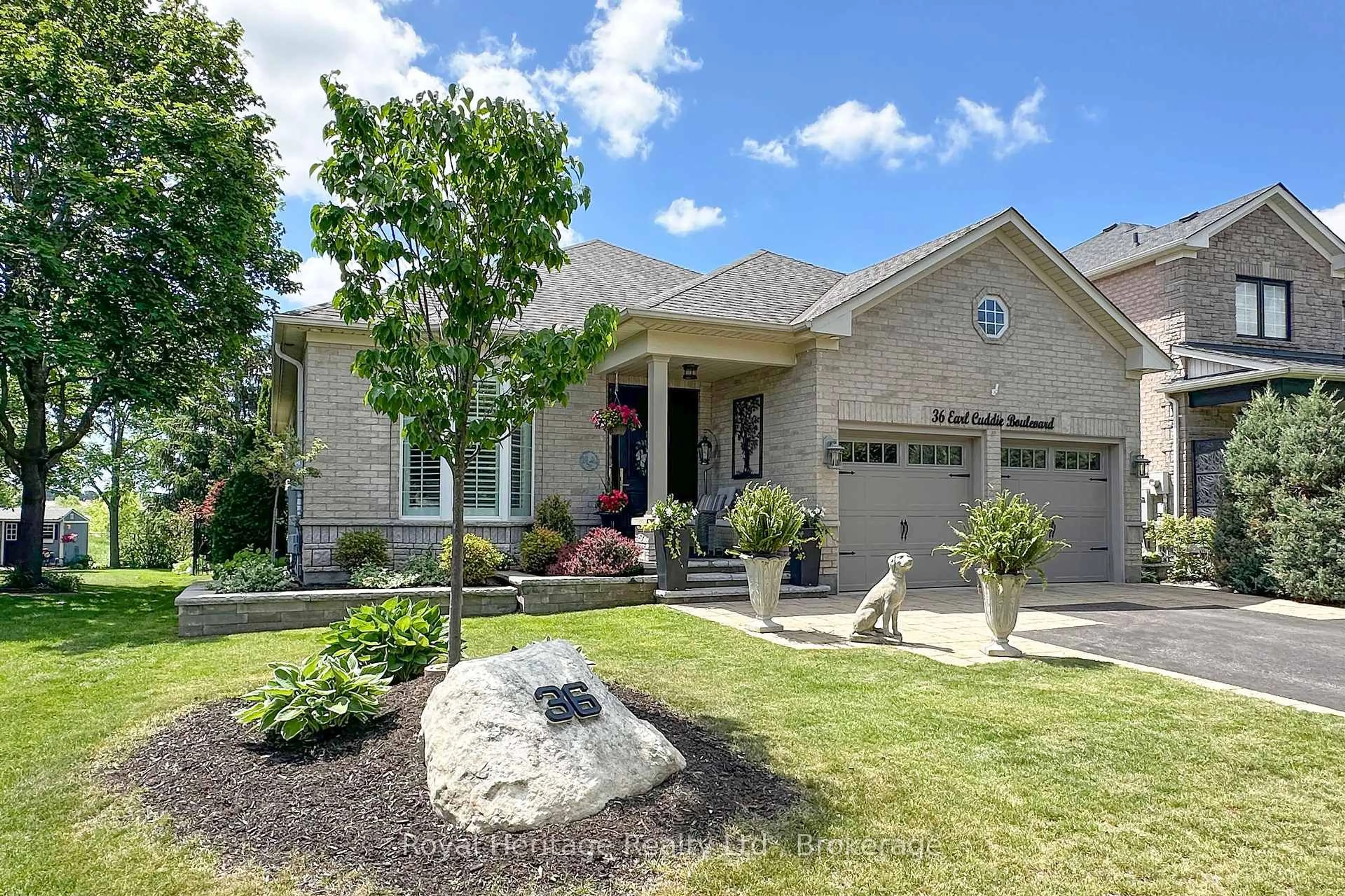 Home with brick exterior material, street for 36 Earl Cuddie Blvd, Scugog Ontario L9L 1T4