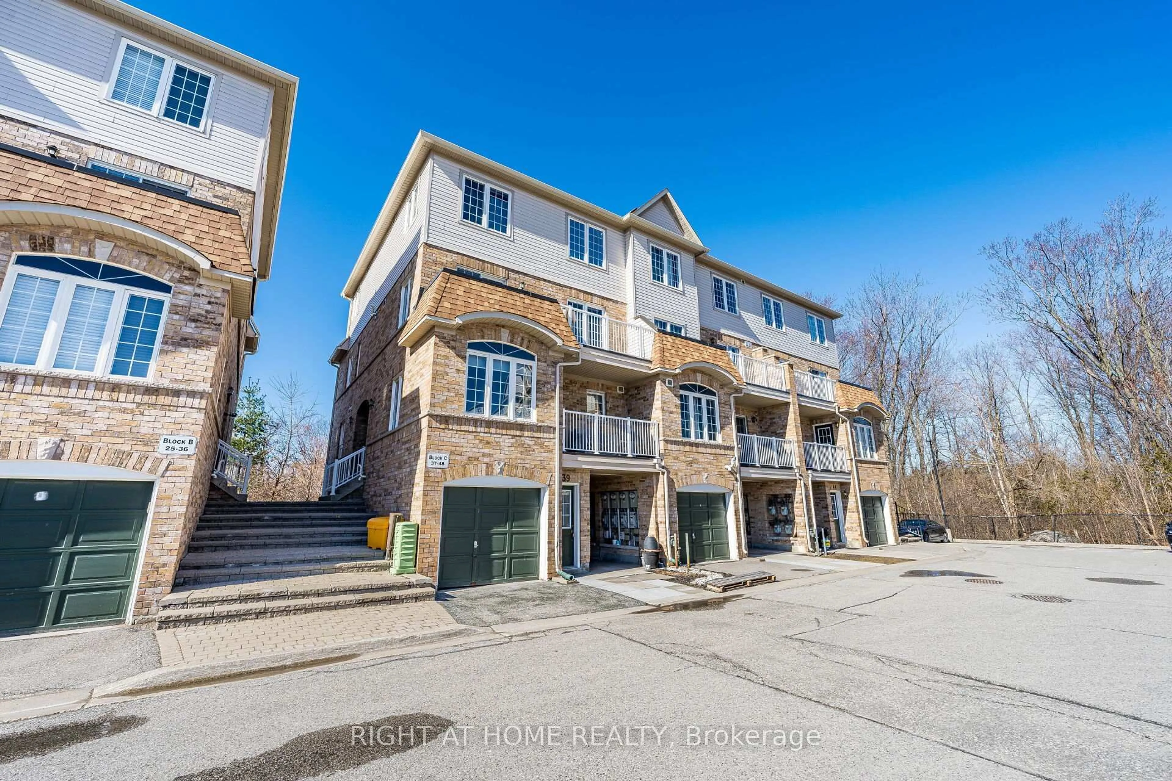A pic from outside/outdoor area/front of a property/back of a property/a pic from drone, unknown for 200 Mclevin Ave #40, Toronto Ontario M1B 6C7