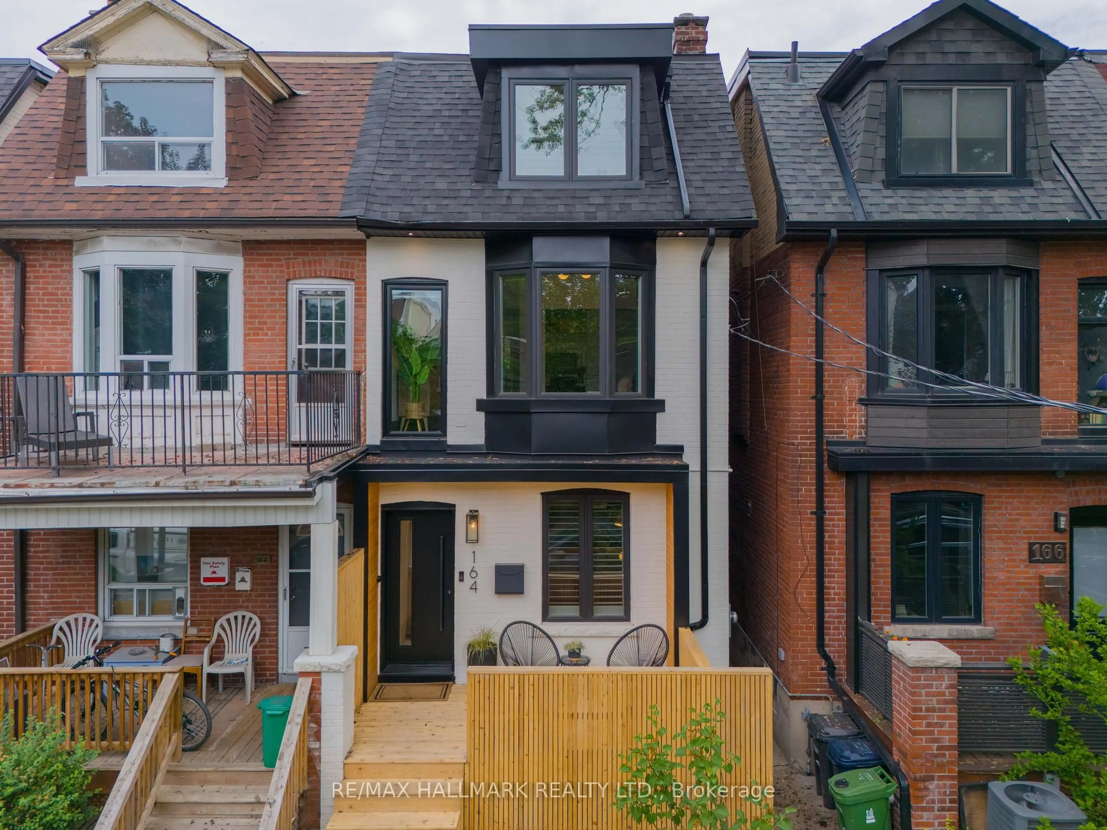 Home with brick exterior material, street for 164 Langley Ave, Toronto Ontario M4K 1B7