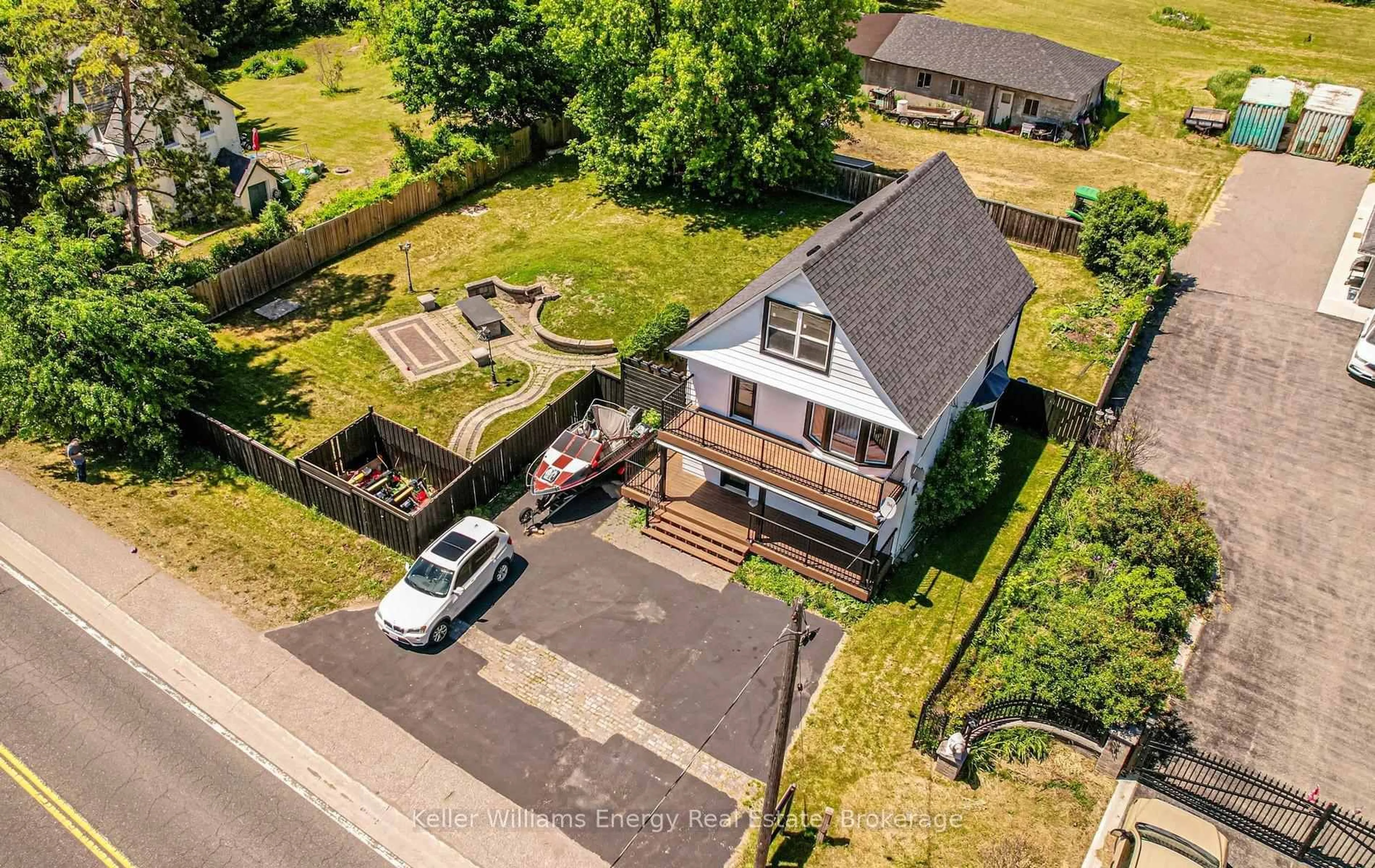 A pic from outside/outdoor area/front of a property/back of a property/a pic from drone, street for 220 Highway No. 7, Pickering Ontario L1Y 0A9