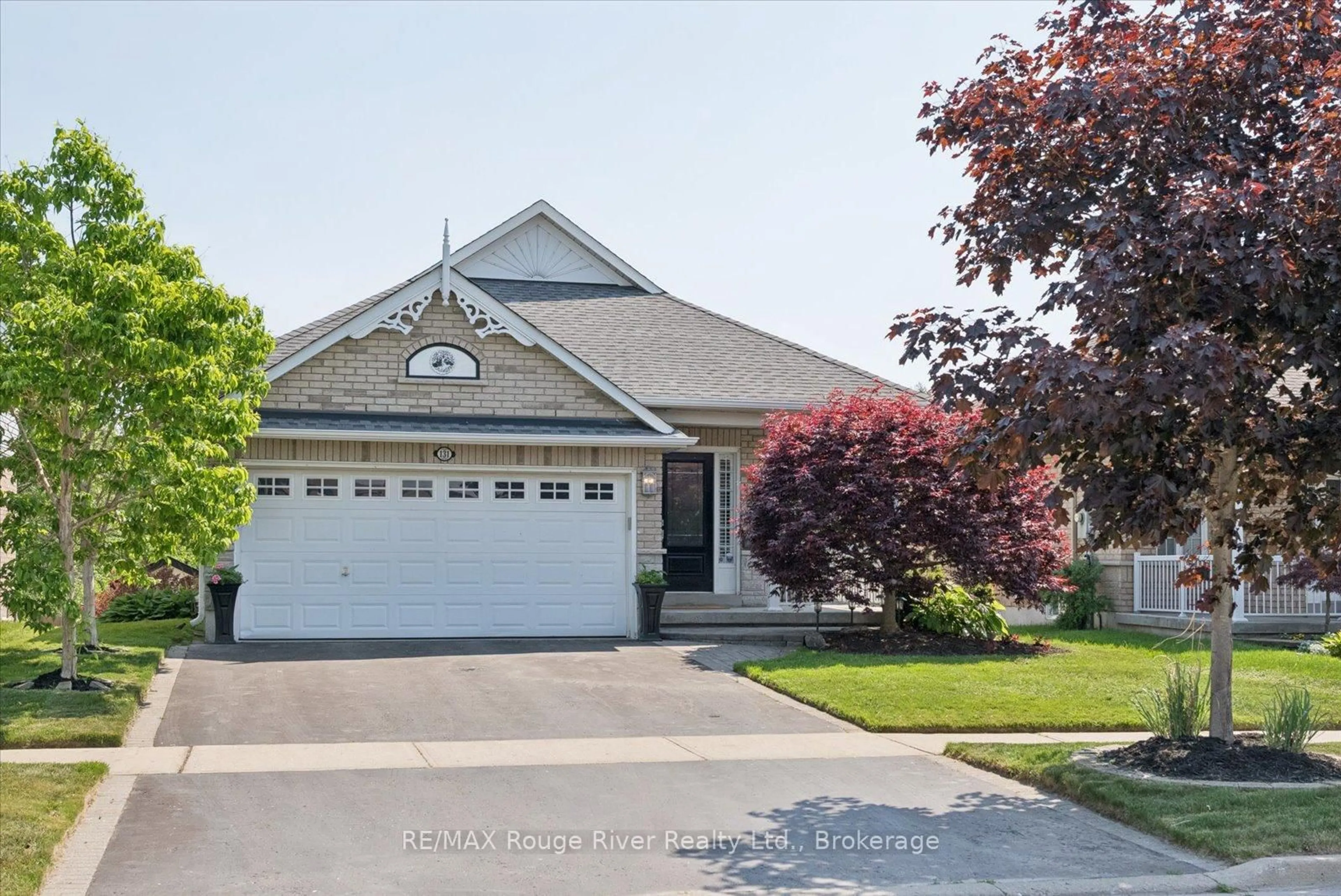 Home with vinyl exterior material, street for 131 Guildwood Dr, Clarington Ontario L1C 5C7