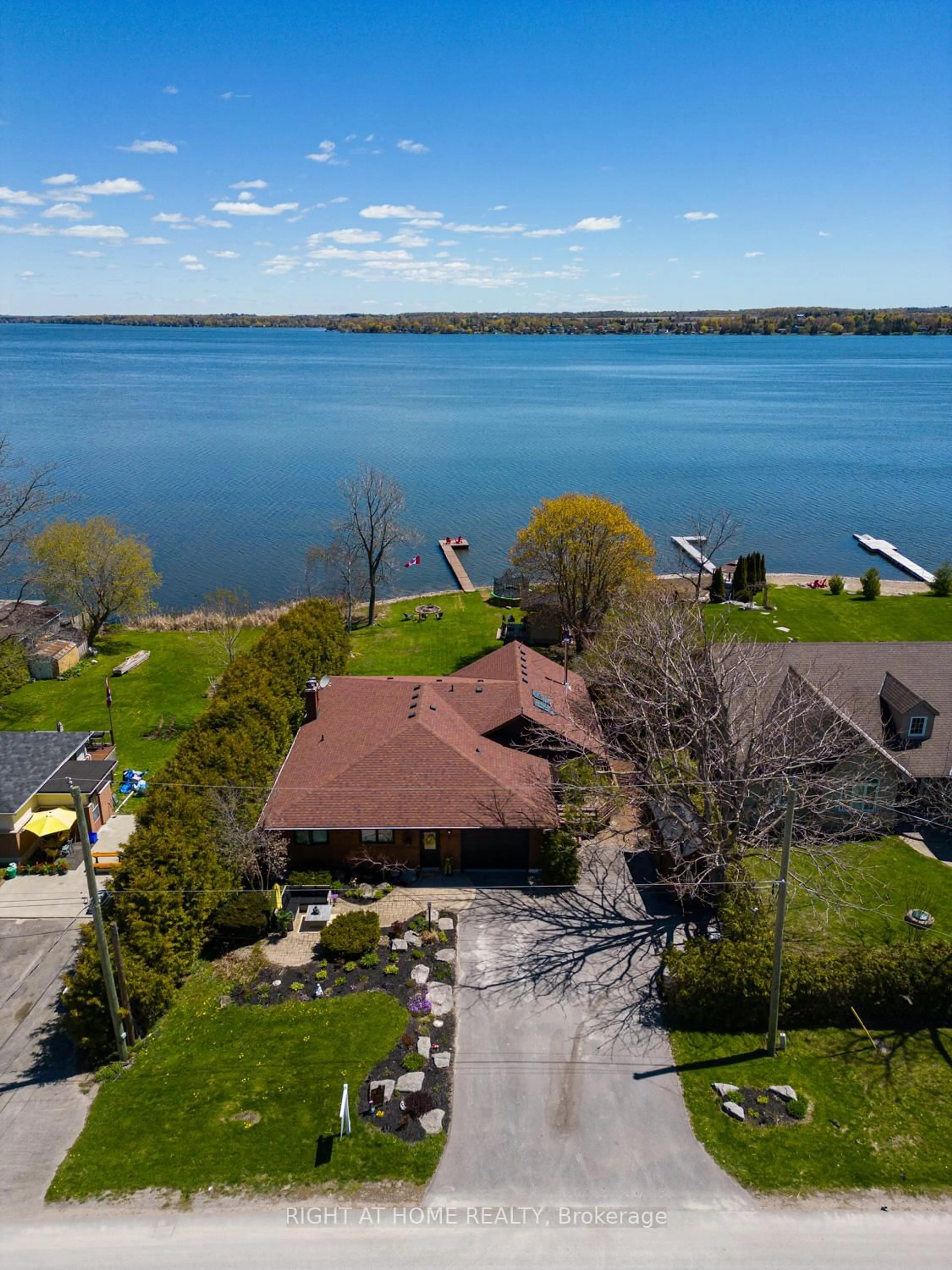 A pic from outside/outdoor area/front of a property/back of a property/a pic from drone, water/lake/river/ocean view for 77 Aldred Dr, Scugog Ontario L9L 1B4
