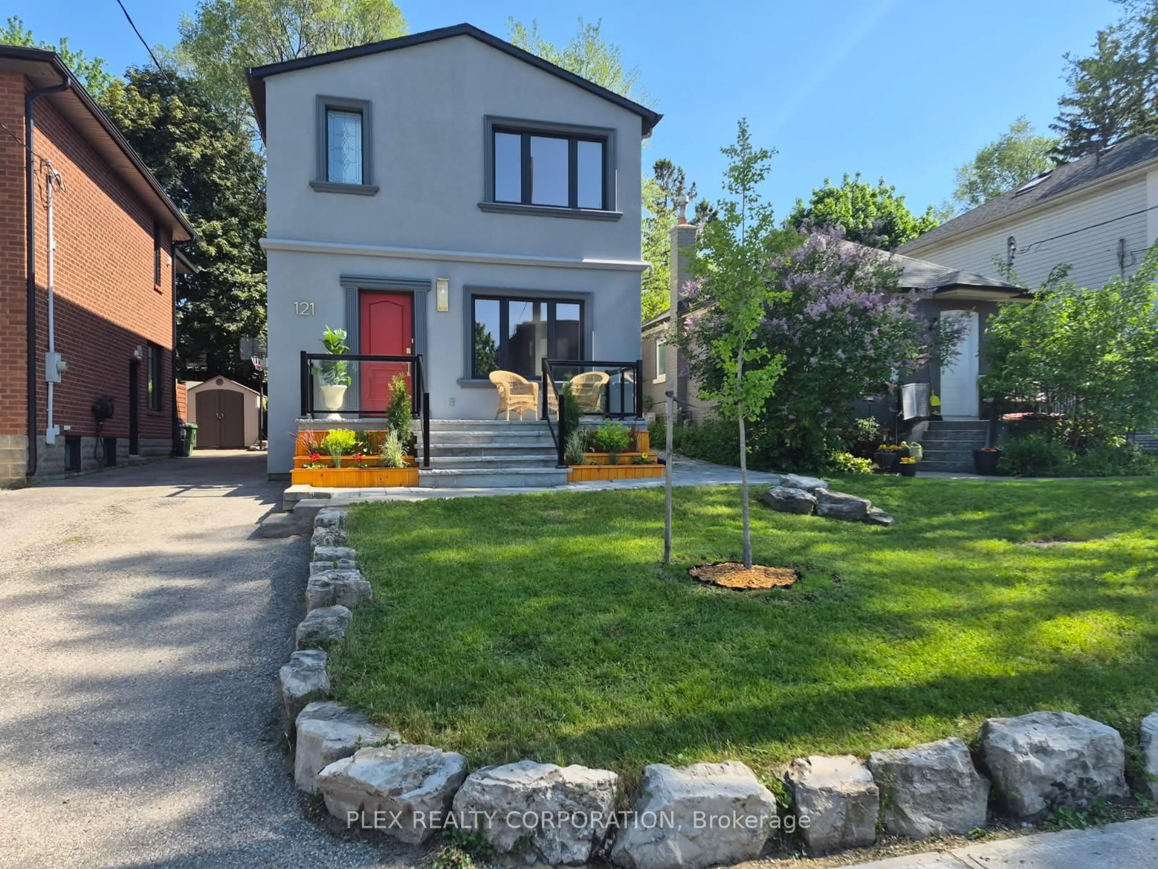 Home with brick exterior material, street for 121 Virginia Ave, Toronto Ontario M4C 2T1