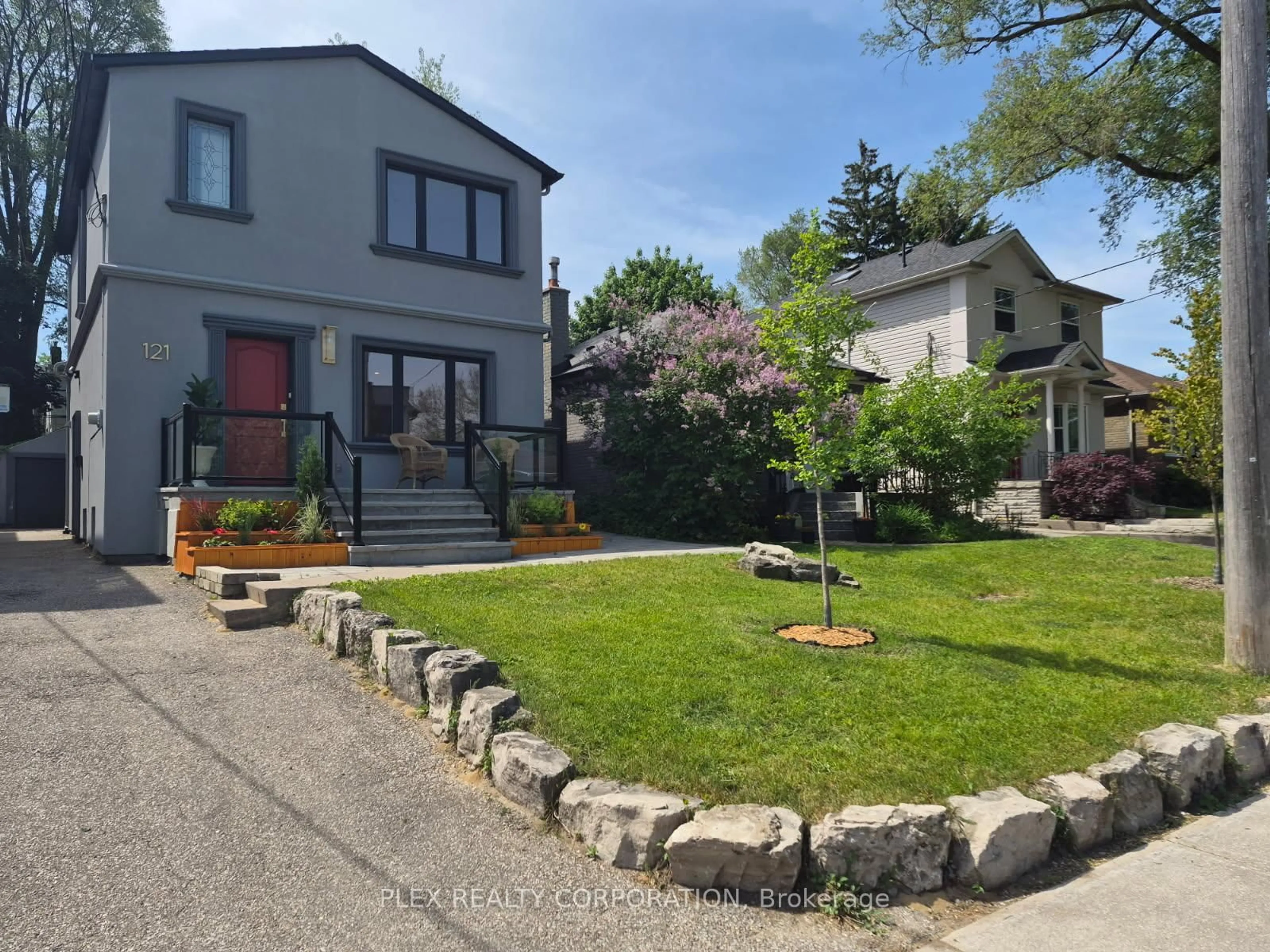 A pic from outside/outdoor area/front of a property/back of a property/a pic from drone, street for 121 Virginia Ave, Toronto Ontario M4C 2T1