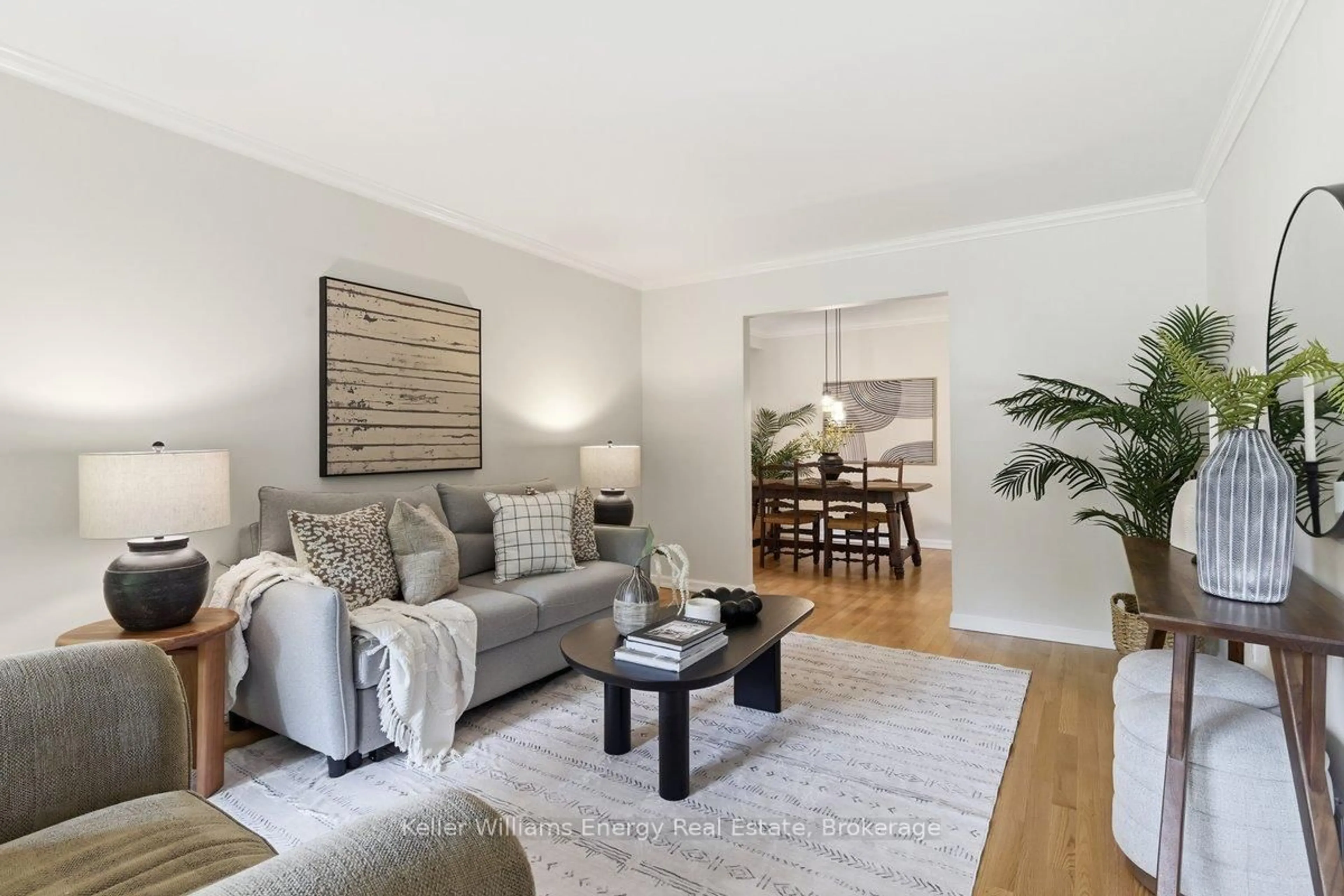 Living room with furniture, wood/laminate floor for 803 Rodney Crt, Oshawa Ontario L1G 6V6