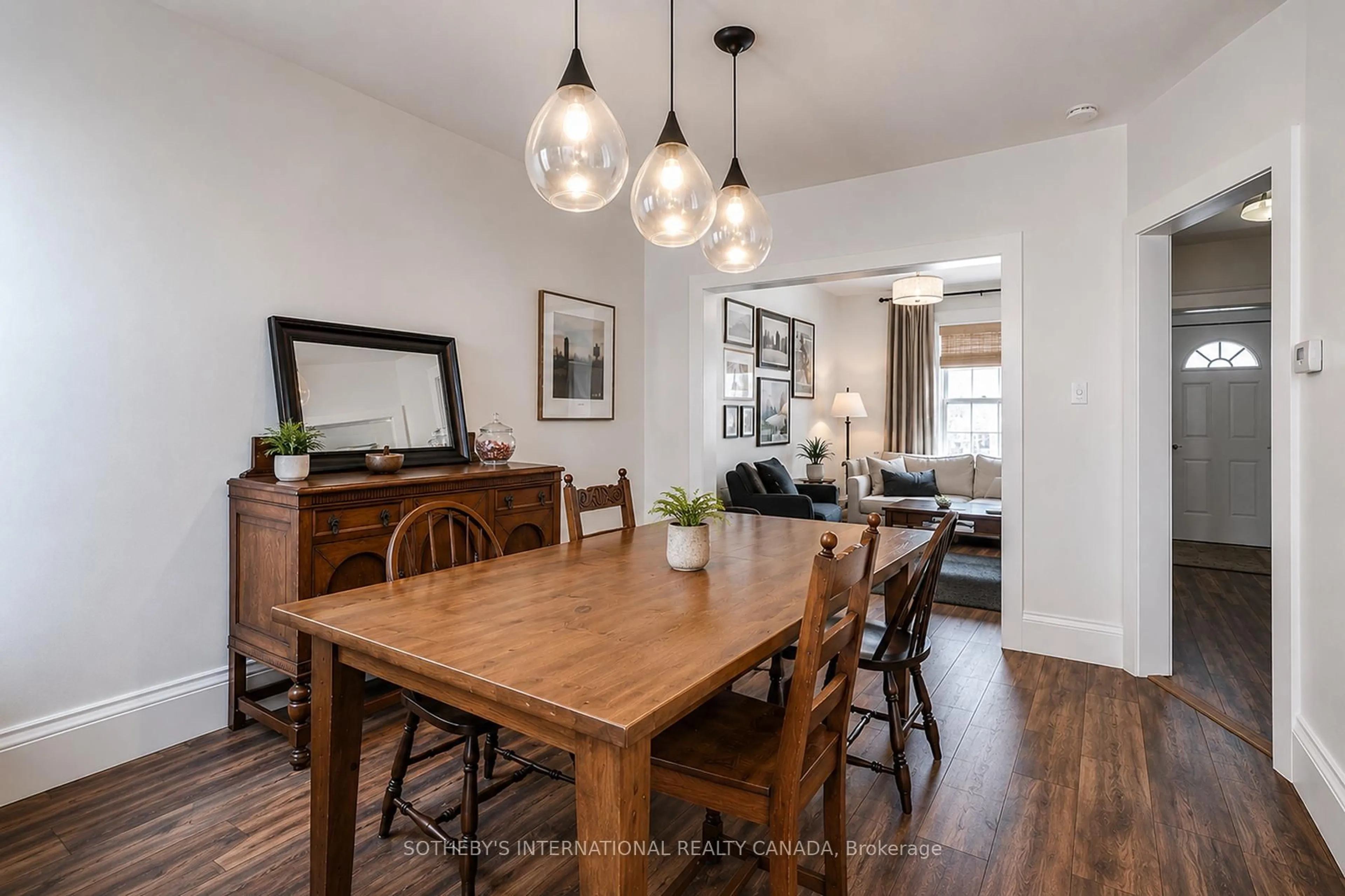 Dining room, wood/laminate floor for 635 Pape Ave, Toronto Ontario M4K 3S2