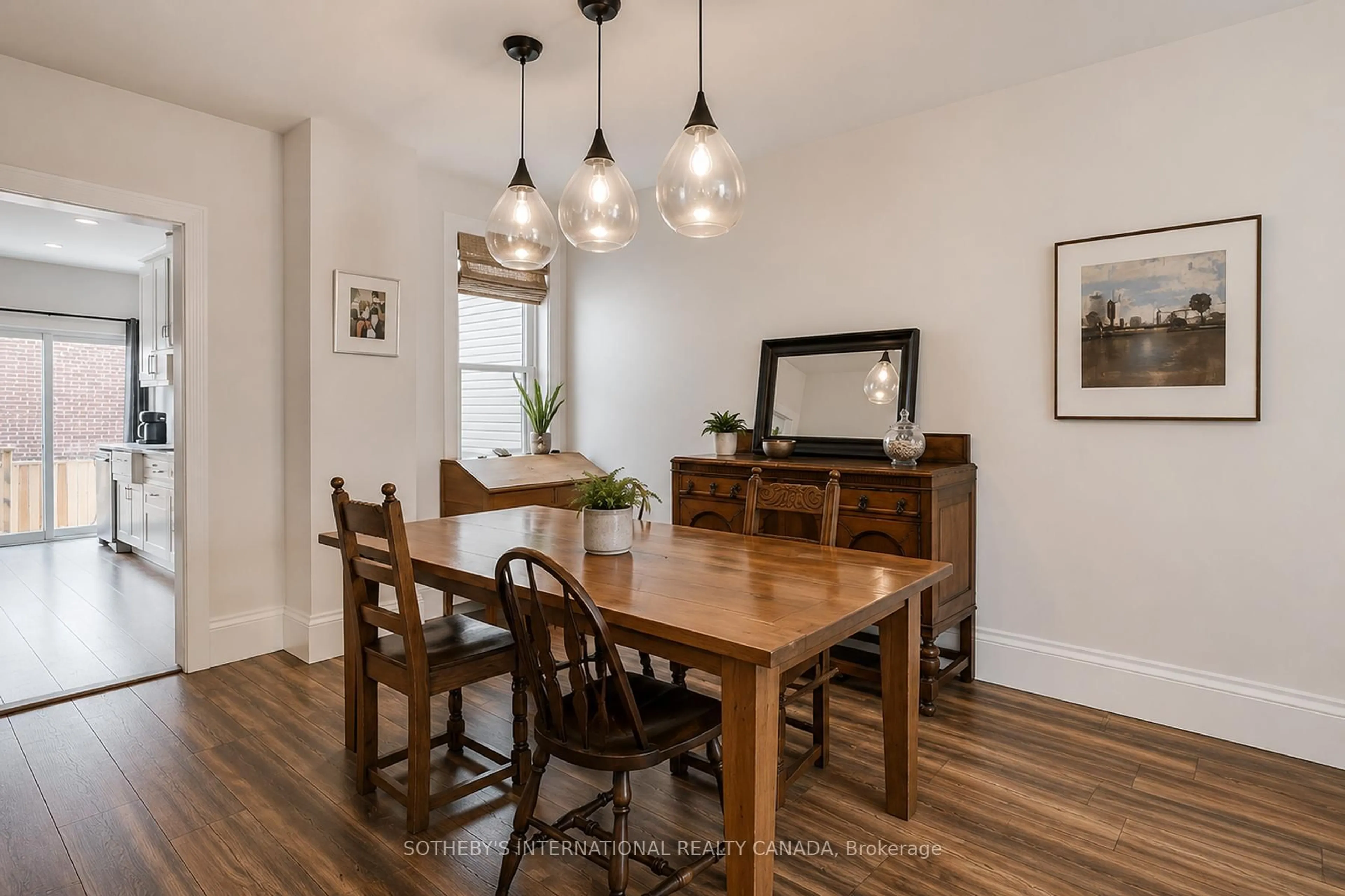 Dining room, wood/laminate floor for 635 Pape Ave, Toronto Ontario M4K 3S2
