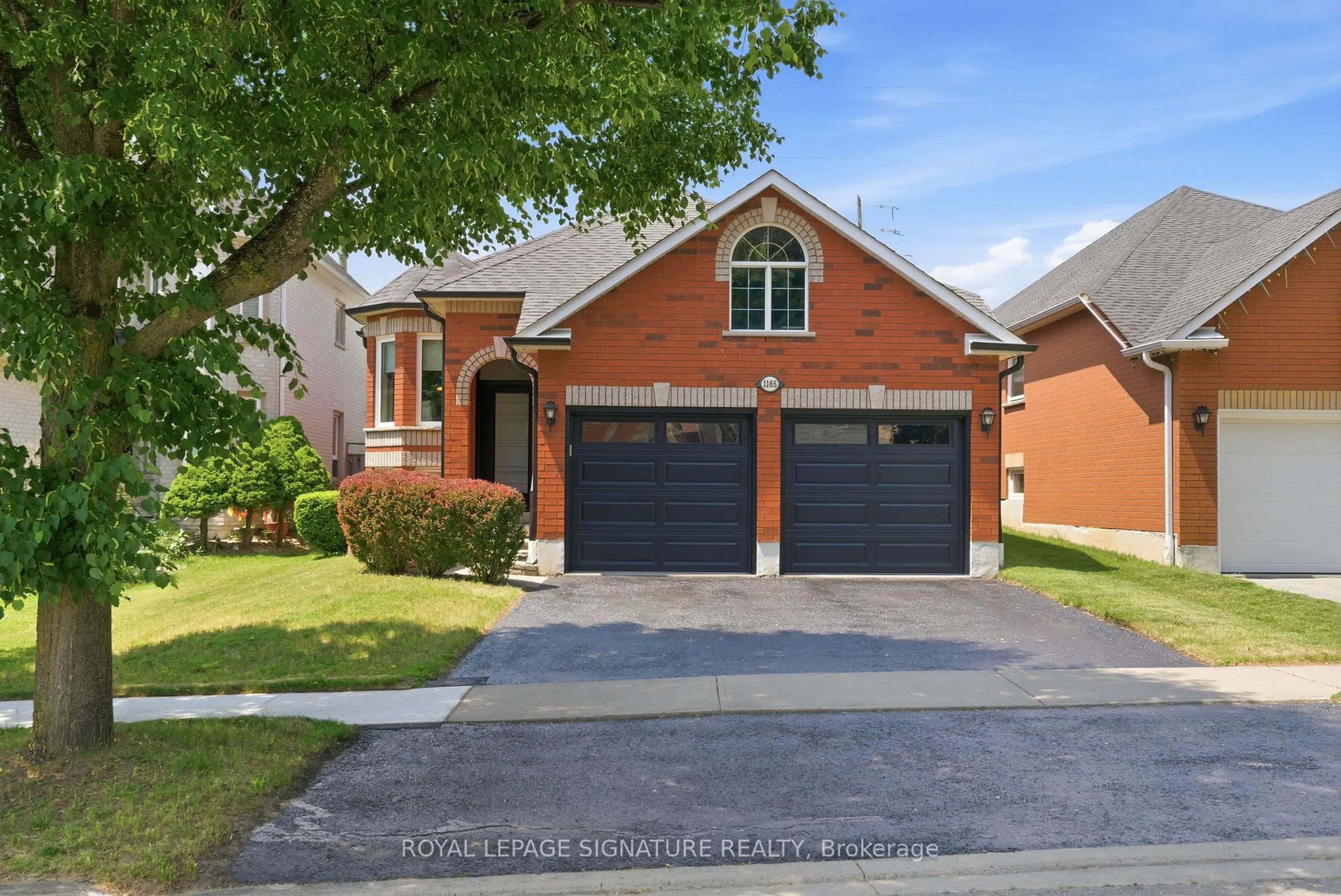 Home with brick exterior material, street for 1165 Windgrove Sq, Pickering Ontario L1X 2S6