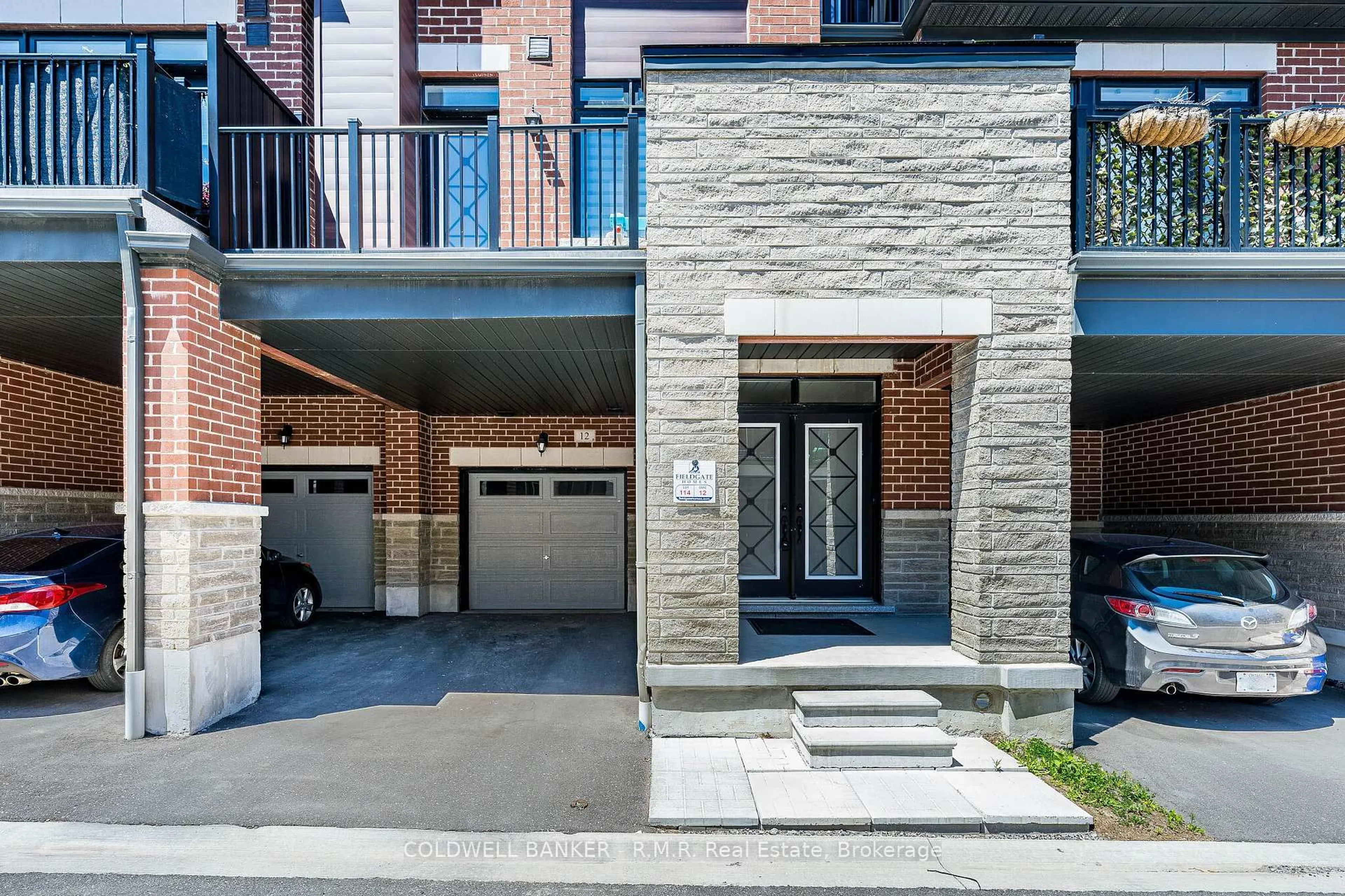 Home with brick exterior material, street for 12 Broylio Lane, Ajax Ontario L1S 0H1