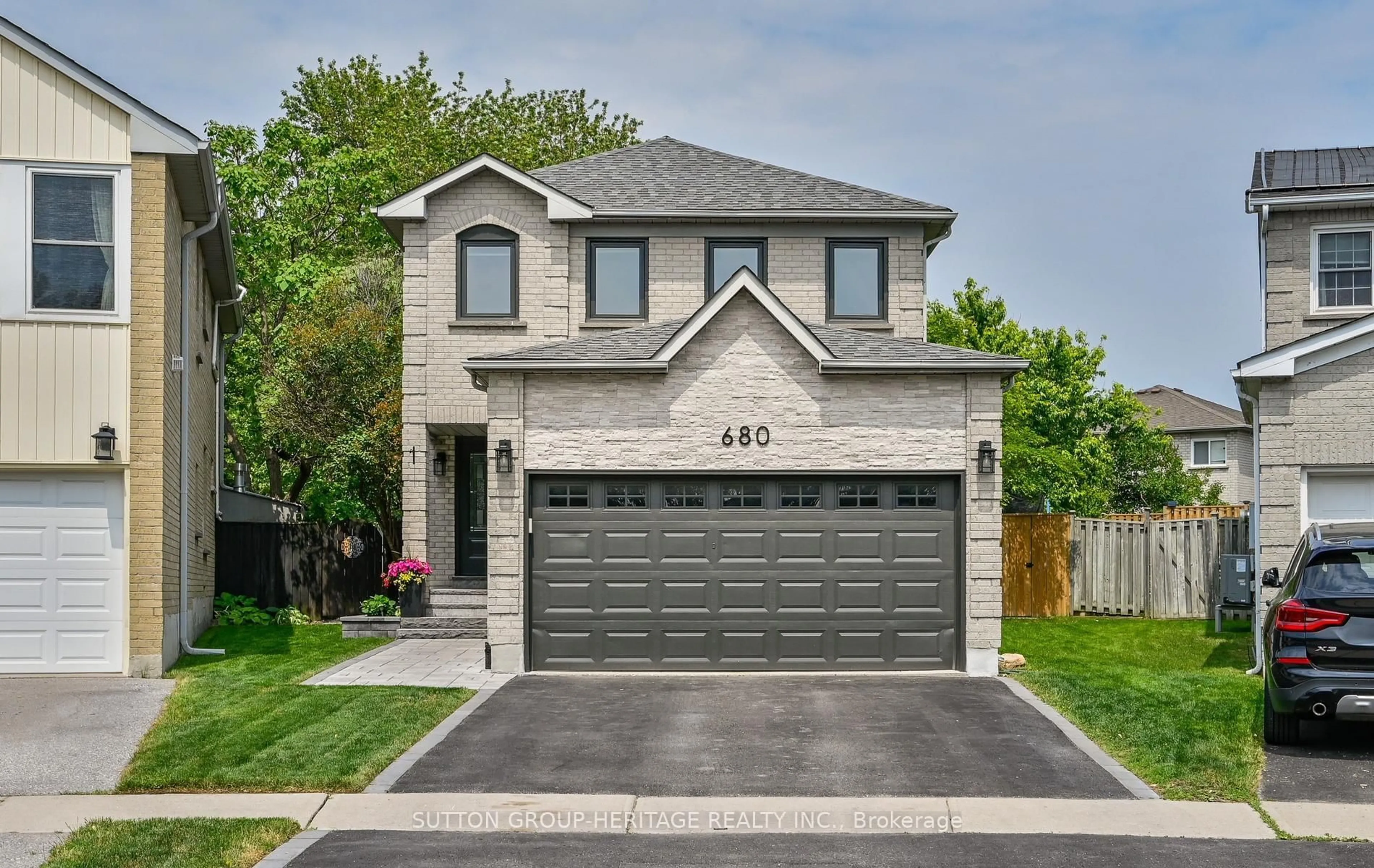 Home with brick exterior material, street for 680 Eramosa Cres, Pickering Ontario L1V 5N4