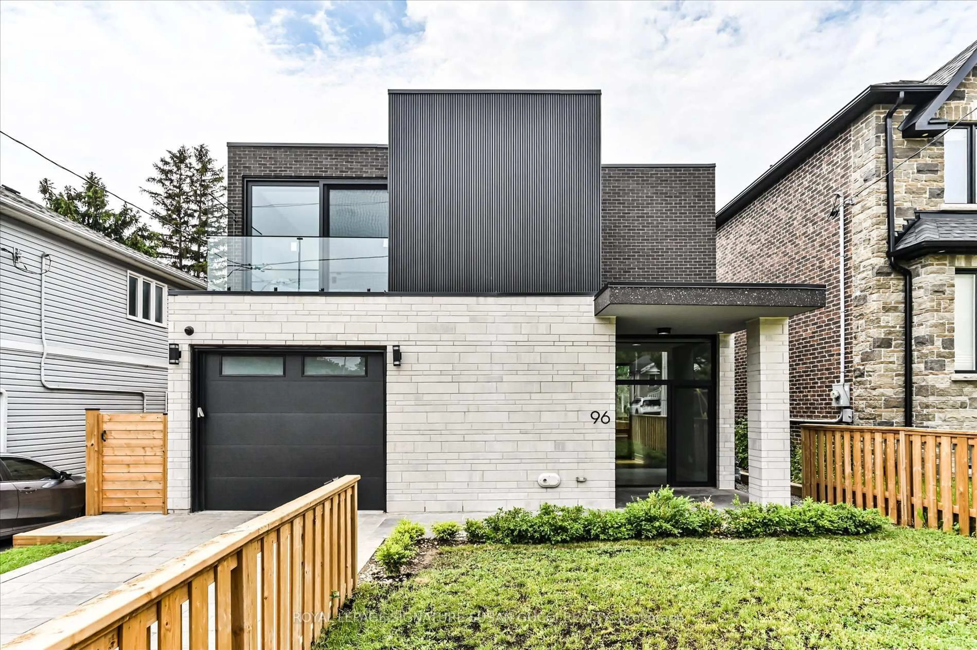 Home with brick exterior material, street for 96 Squires Ave, Toronto Ontario M4B 2S1