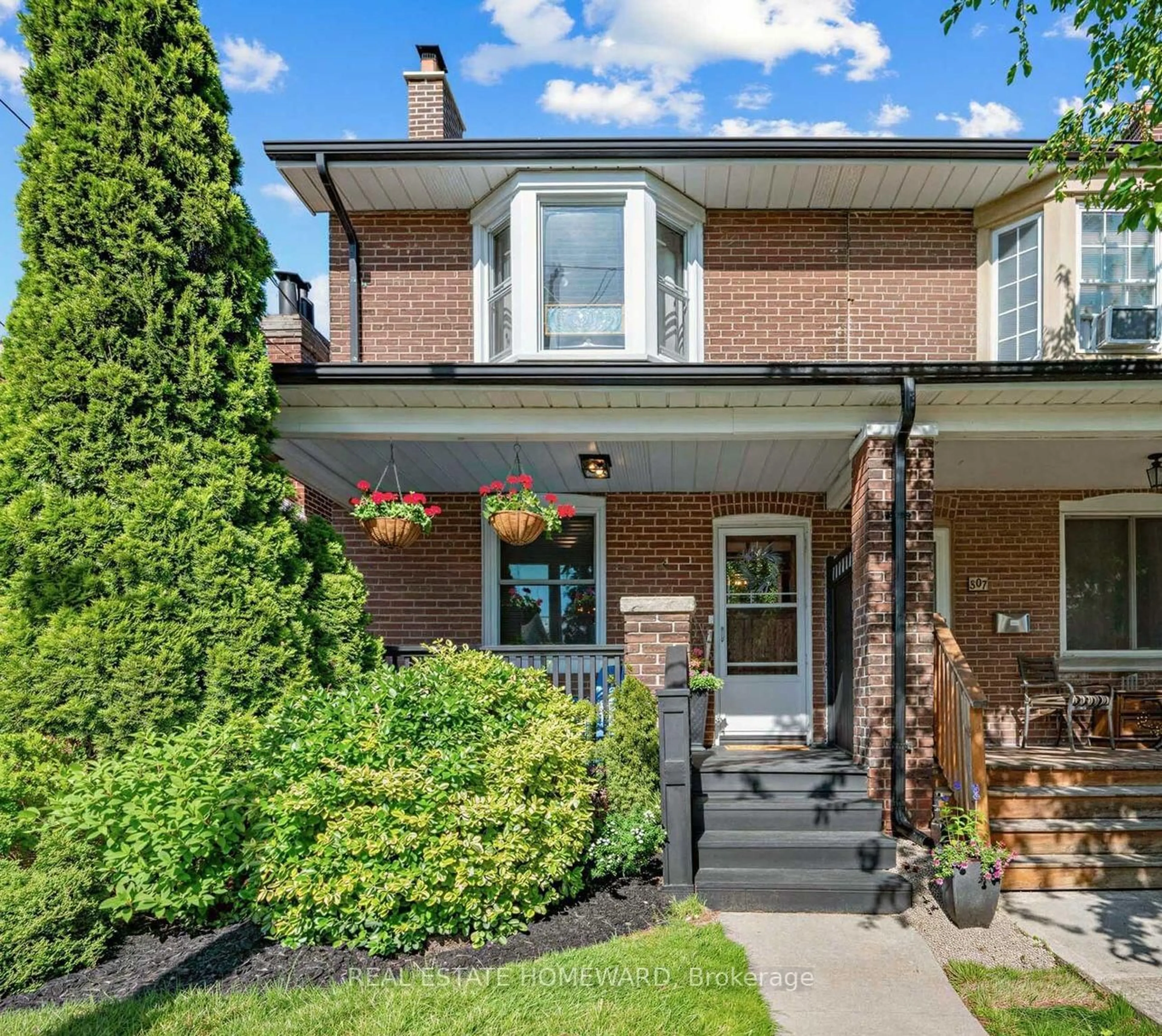 Home with brick exterior material, street for 309 Chisholm Ave, Toronto Ontario M4C 4W5