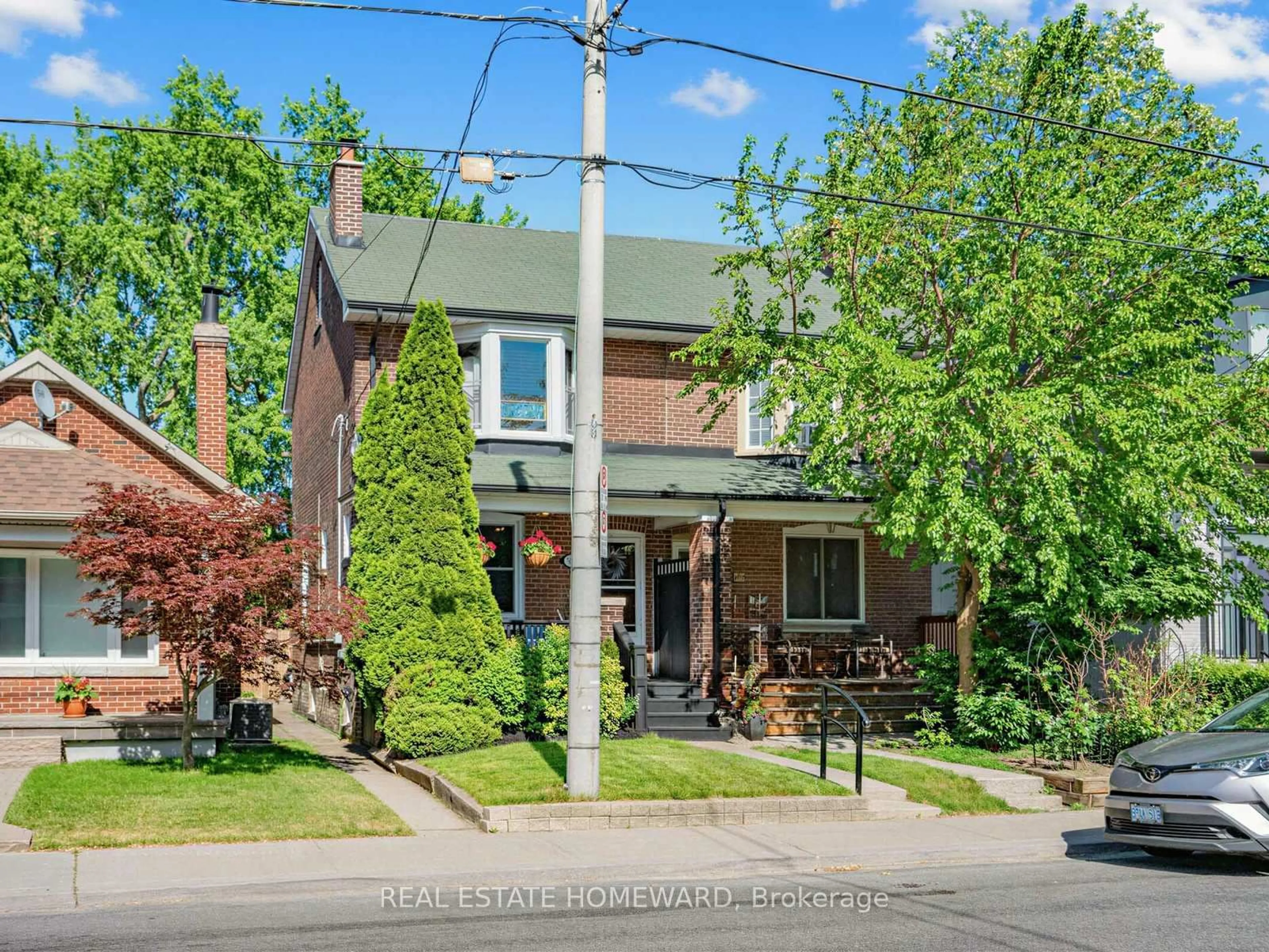 Home with brick exterior material, street for 309 Chisholm Ave, Toronto Ontario M4C 4W5