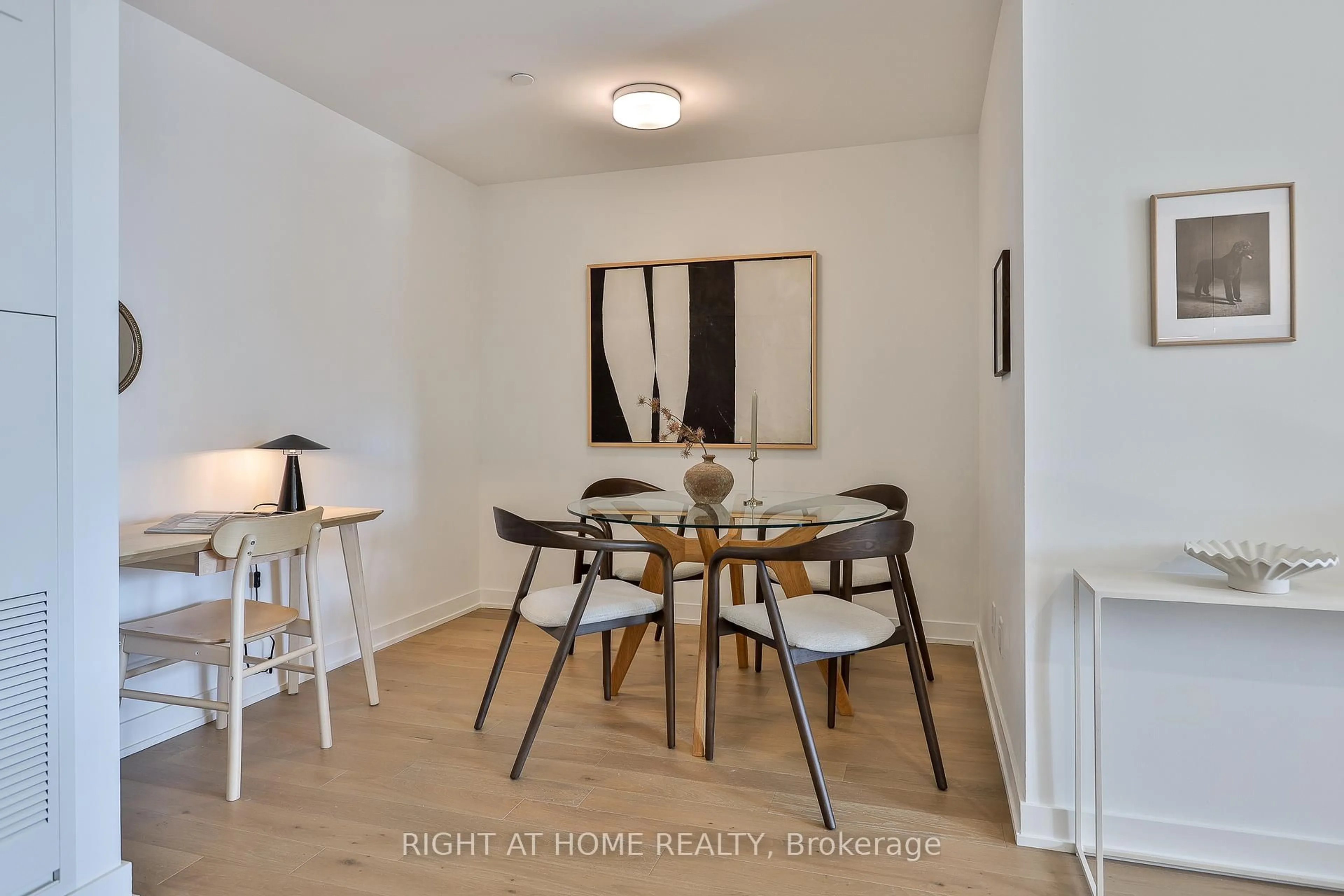 Dining room, wood/laminate floor for 1161 Kingston Rd #205, Toronto Ontario M1N 1P2