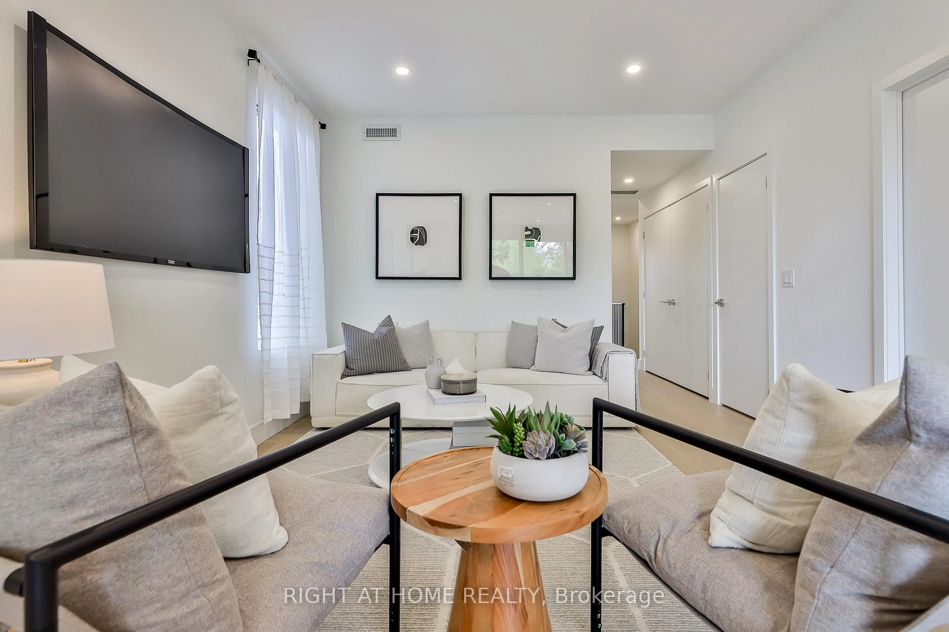 Living room with furniture, unknown for 2343 Gerrard St #Centre, Toronto Ontario M4E 2E6
