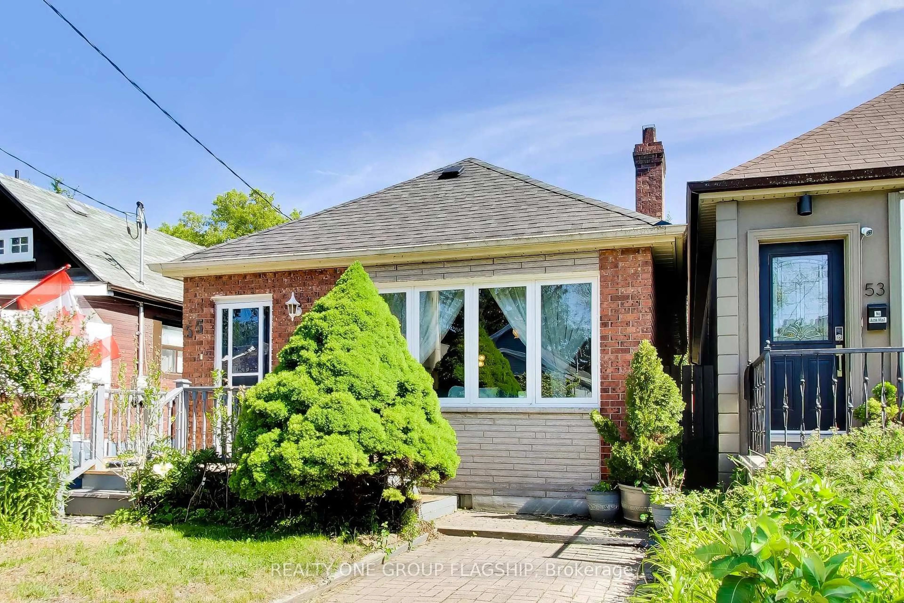 Home with brick exterior material, street for 55 Frater Ave, Toronto Ontario M4C 2H5
