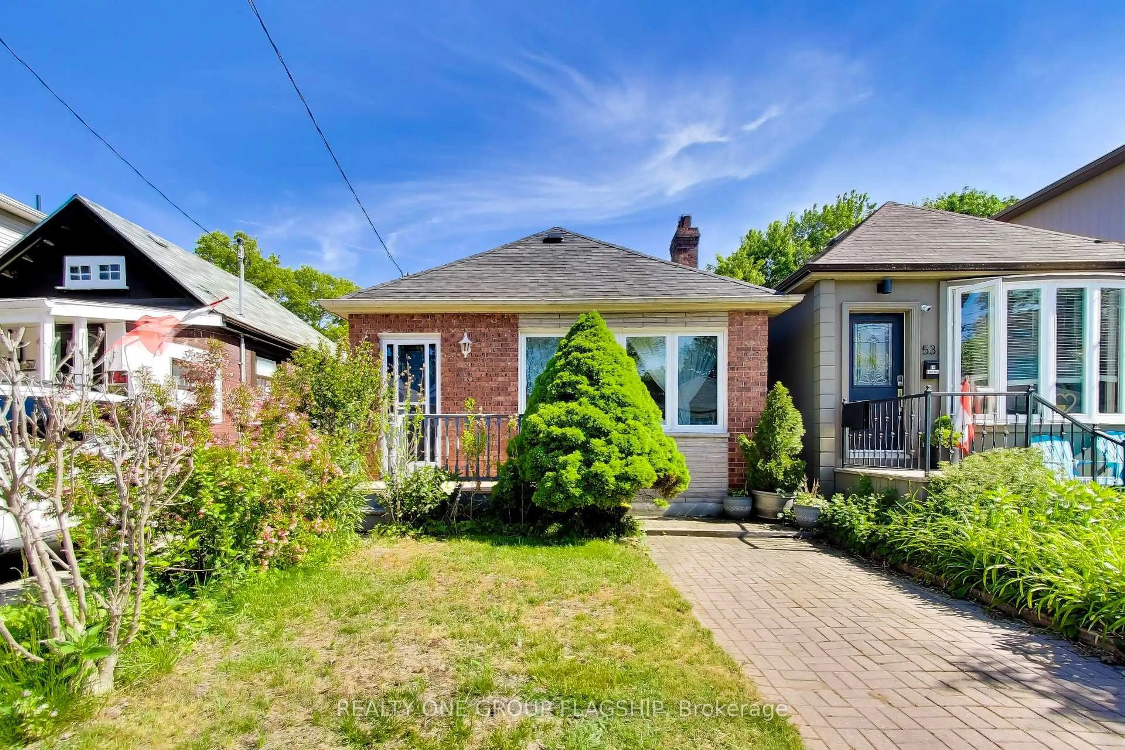 Home with brick exterior material, street for 55 Frater Ave, Toronto Ontario M4C 2H5