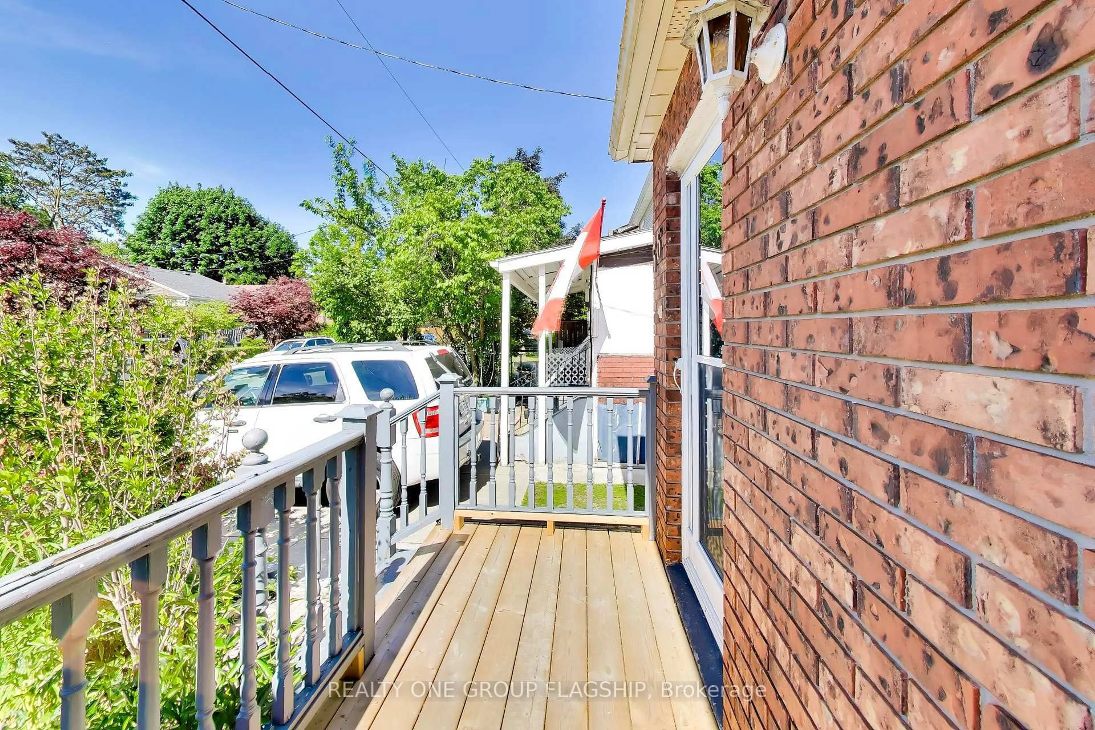 A pic from outside/outdoor area/front of a property/back of a property/a pic from drone, street for 55 Frater Ave, Toronto Ontario M4C 2H5