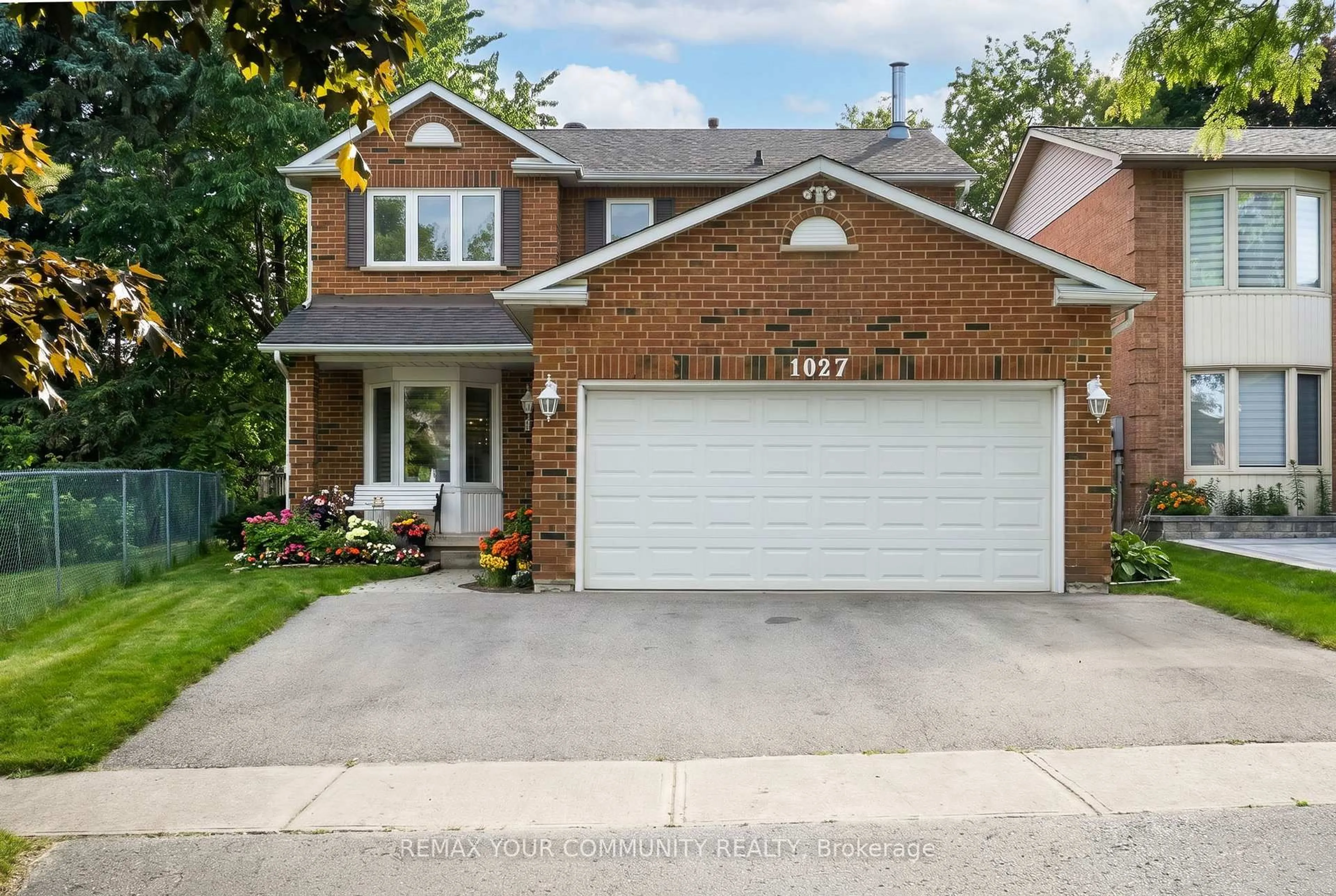 Home with brick exterior material, street for 1027 Benton Cres, Pickering Ontario L1X 1M8