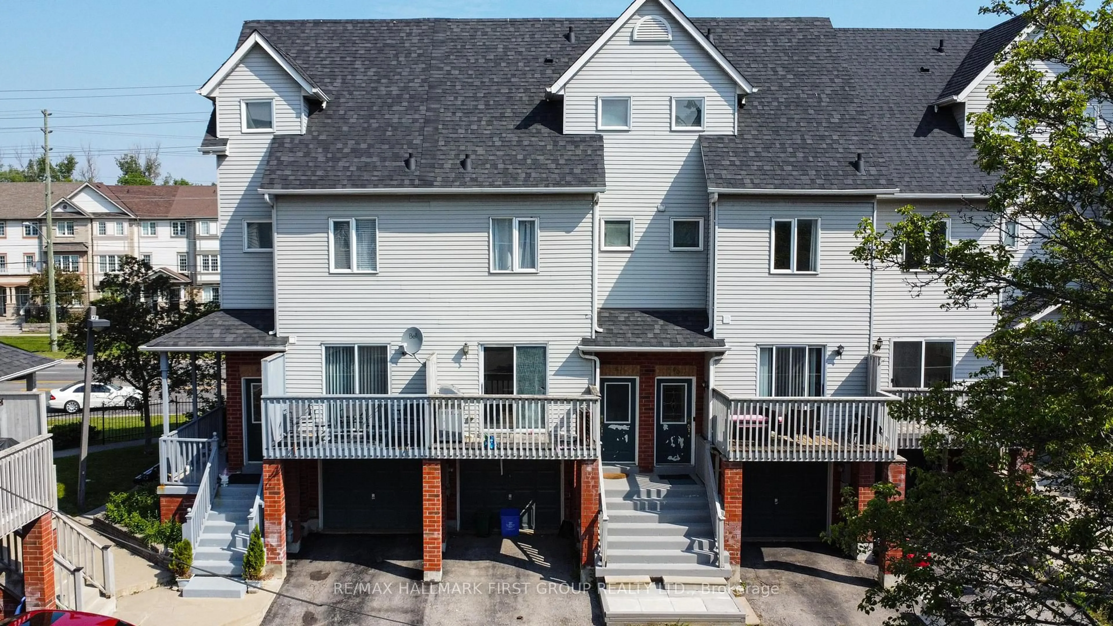 A pic from outside/outdoor area/front of a property/back of a property/a pic from drone, street for 1865 Kingston Rd #60, Pickering Ontario L1V 7B5
