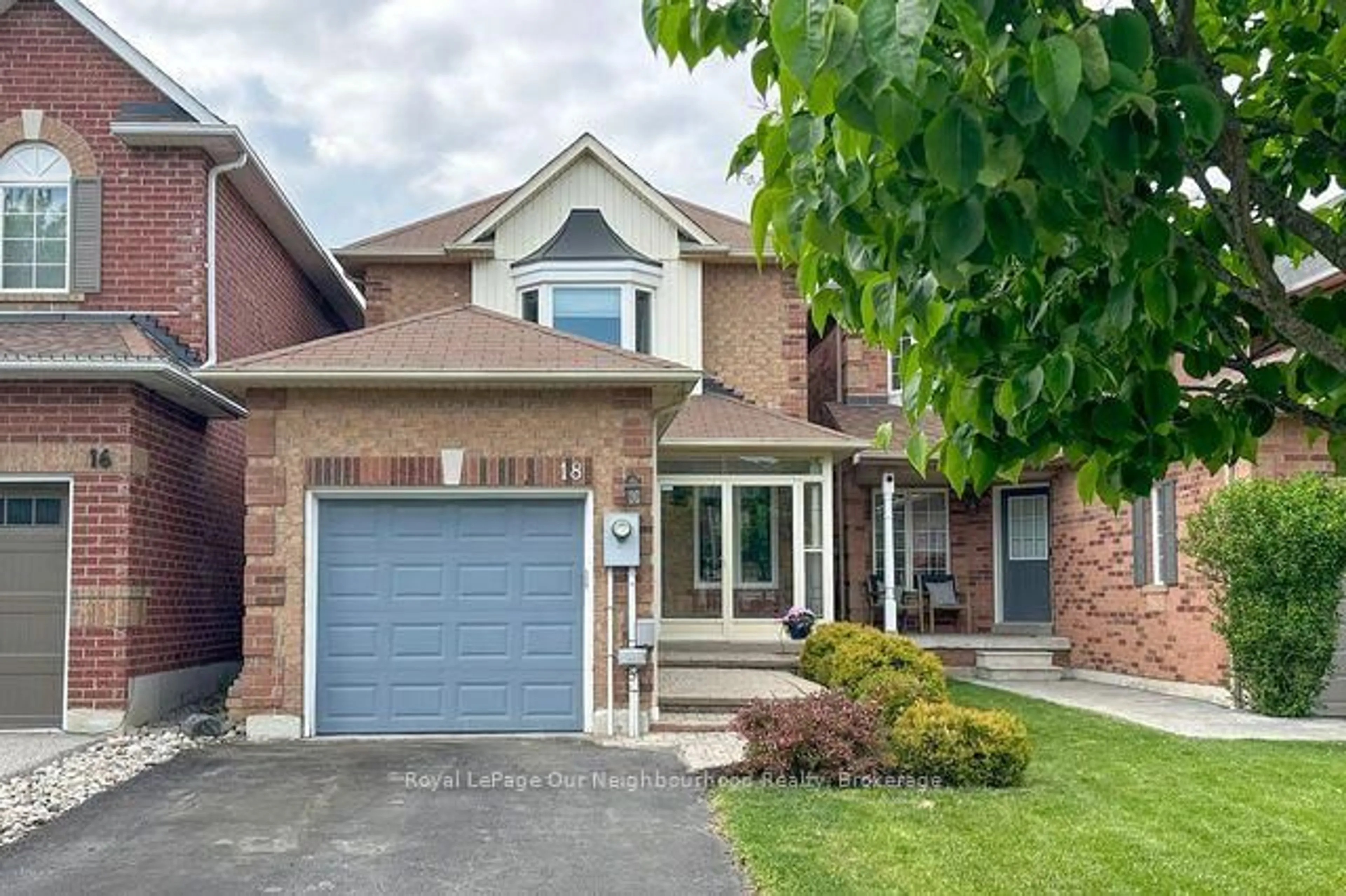 Home with brick exterior material, street for 18 Threadgold Crt, Whitby Ontario L1P 1L9