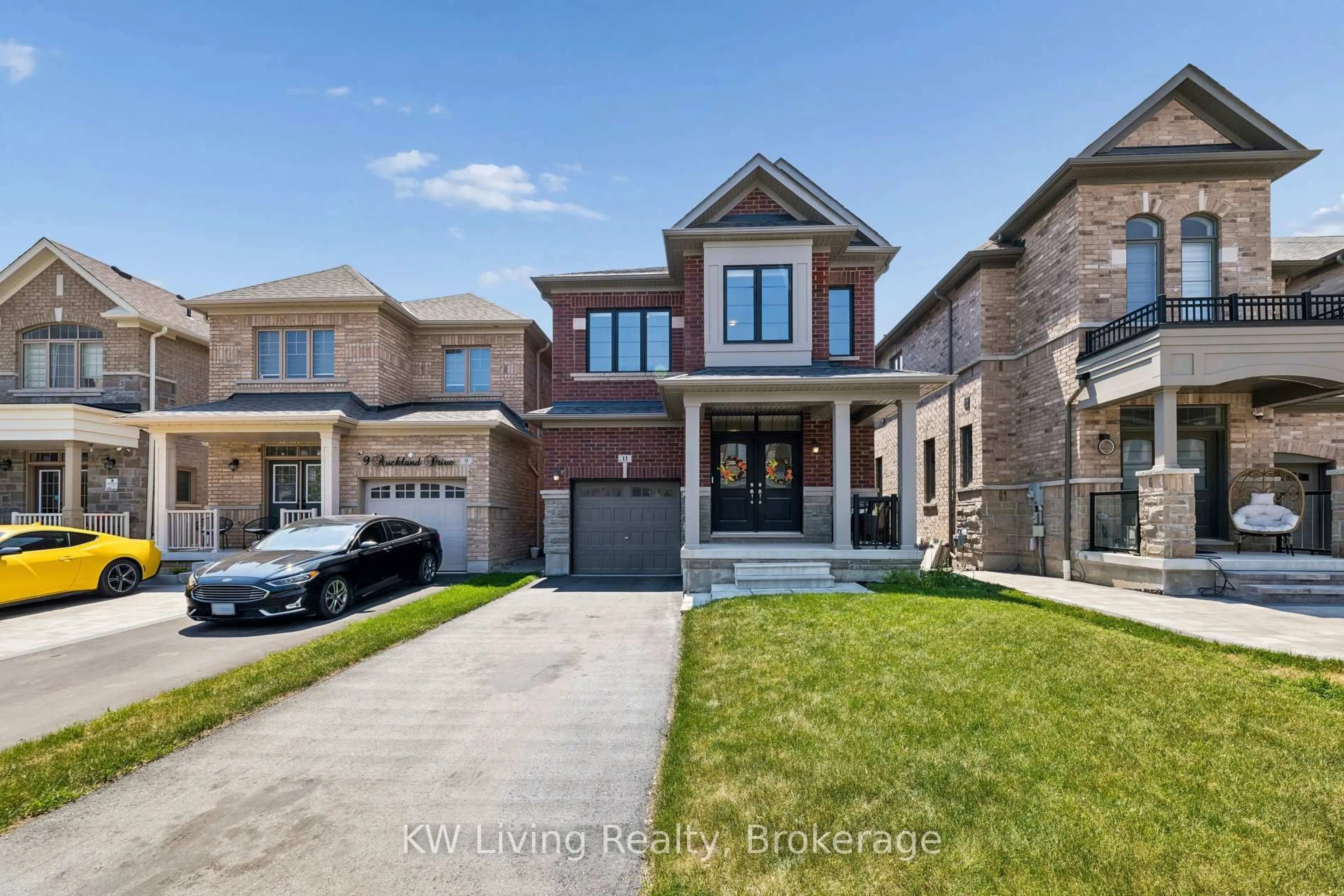 Home with brick exterior material, street for 11 Auckland Dr, Whitby Ontario L1P 0H4