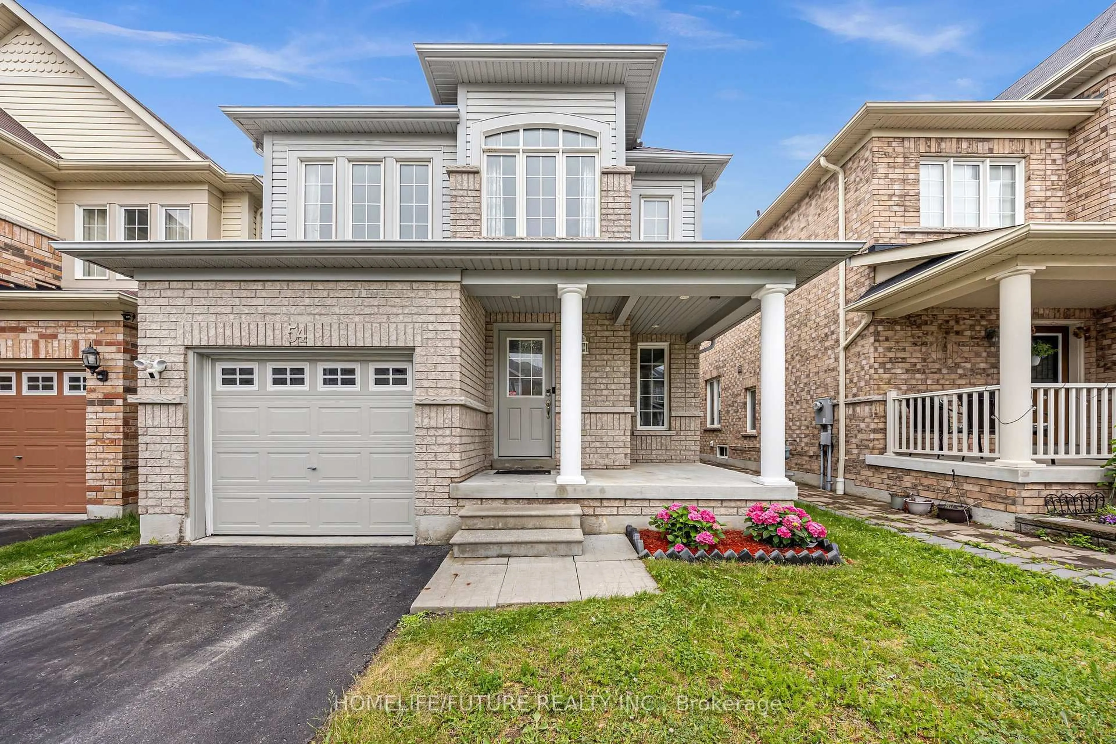 Home with brick exterior material, street for 54 Oswell Dr, Ajax Ontario L1Z 0L4