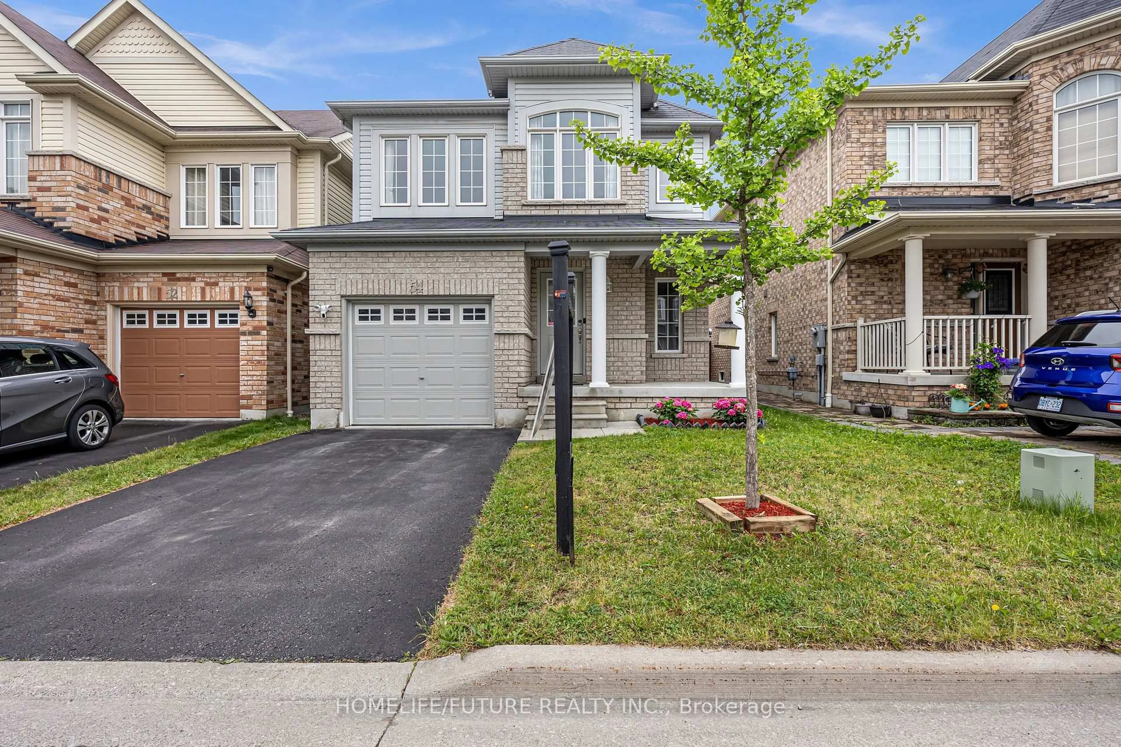 Home with brick exterior material, street for 54 Oswell Dr, Ajax Ontario L1Z 0L4