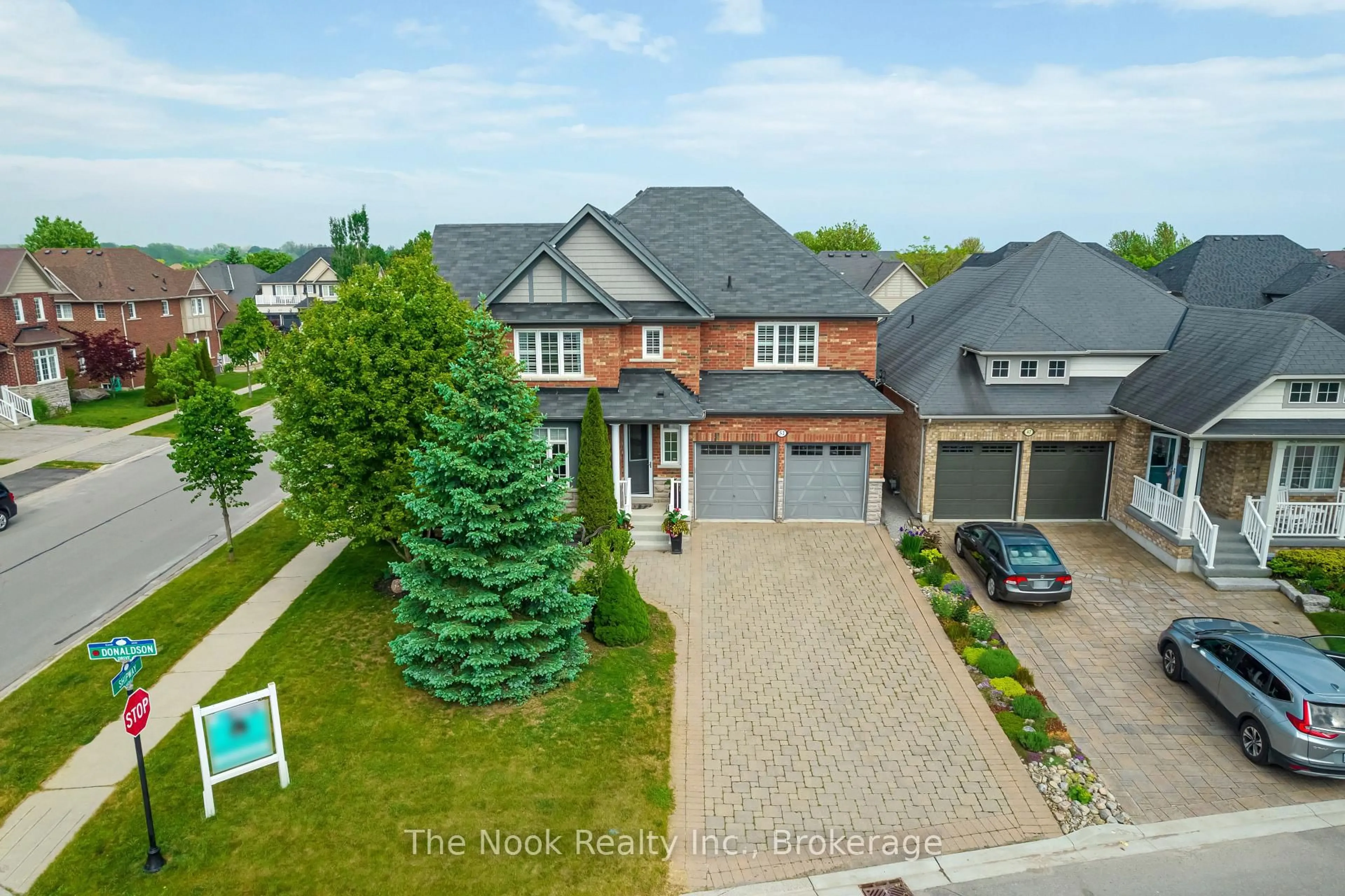 A pic from outside/outdoor area/front of a property/back of a property/a pic from drone, street for 51 Donaldson Dr, Clarington Ontario L1S 1G2