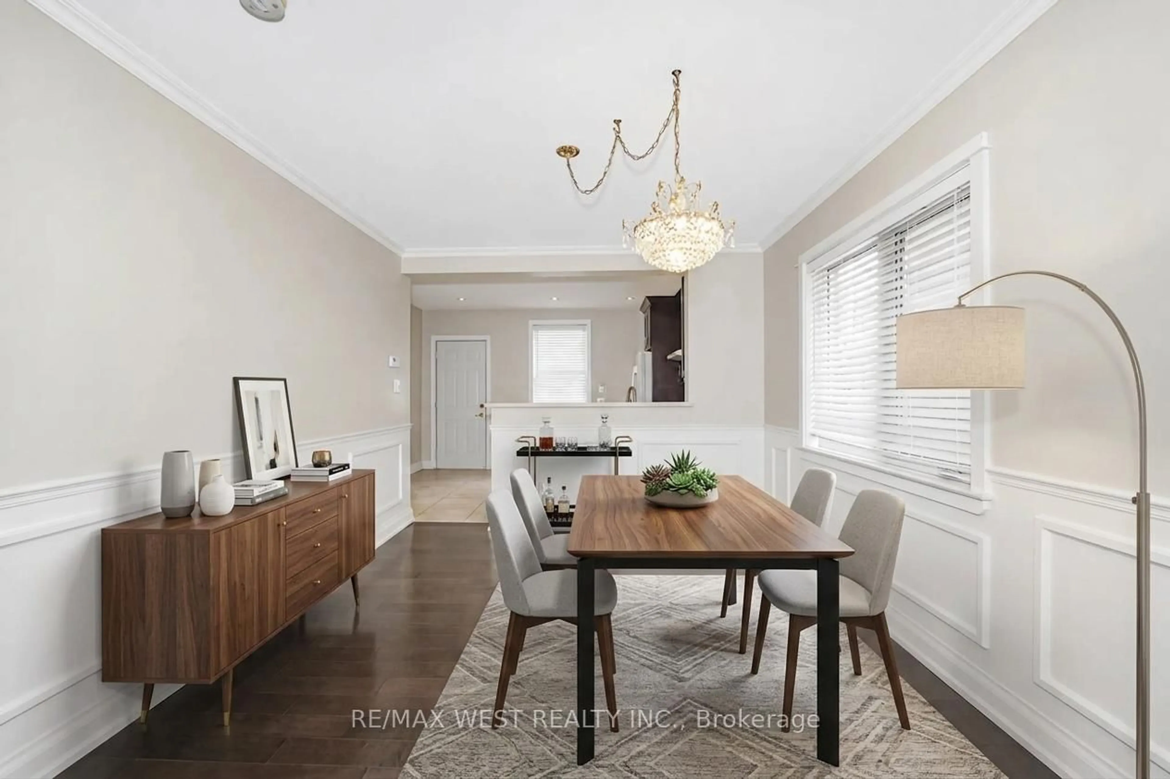 Dining room, wood/laminate floor for 31 Woodmount Ave, Toronto Ontario M4C 3X6