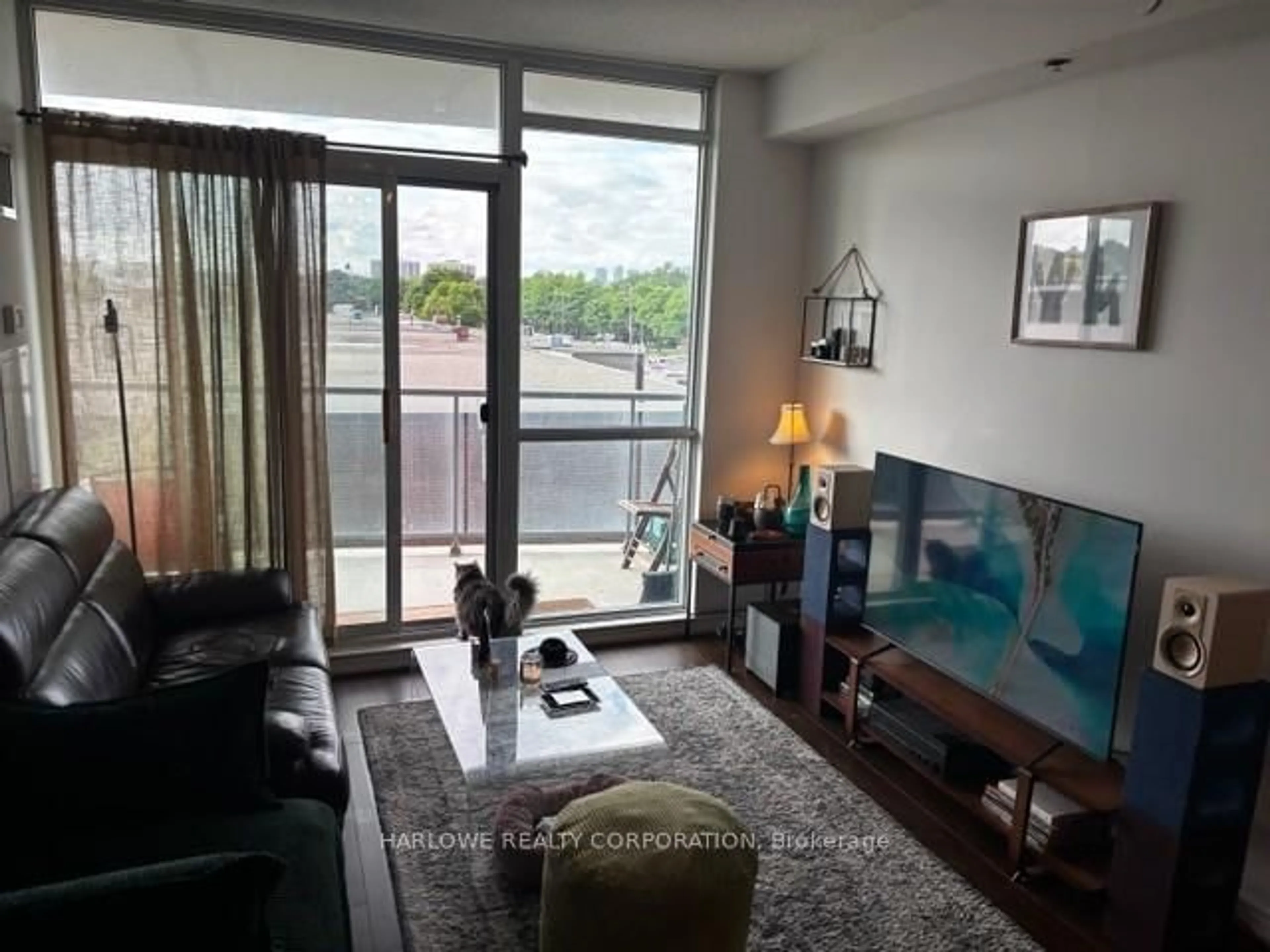 Living room with furniture, unknown for 1328 Birchmount Rd #308, Toronto Ontario M1R 0B6