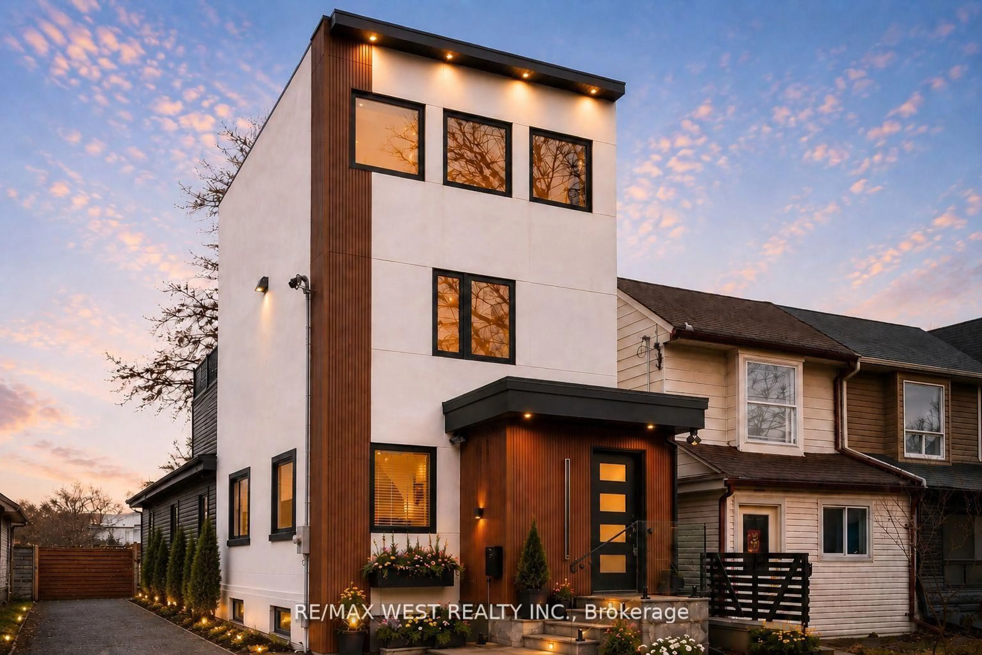 Home with brick exterior material, street for 201 Rhodes Ave, Toronto Ontario M4L 3A2