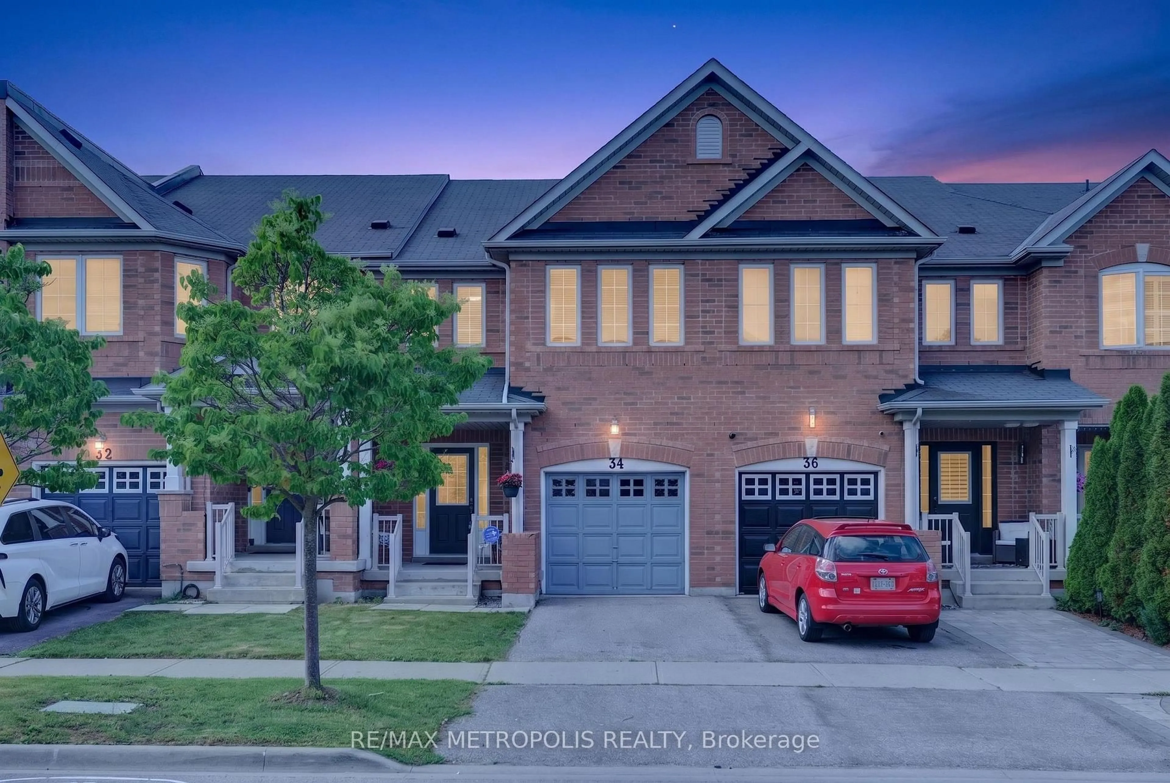 Home with brick exterior material, street for 34 Michaelman Rd, Ajax Ontario L1S 0C9
