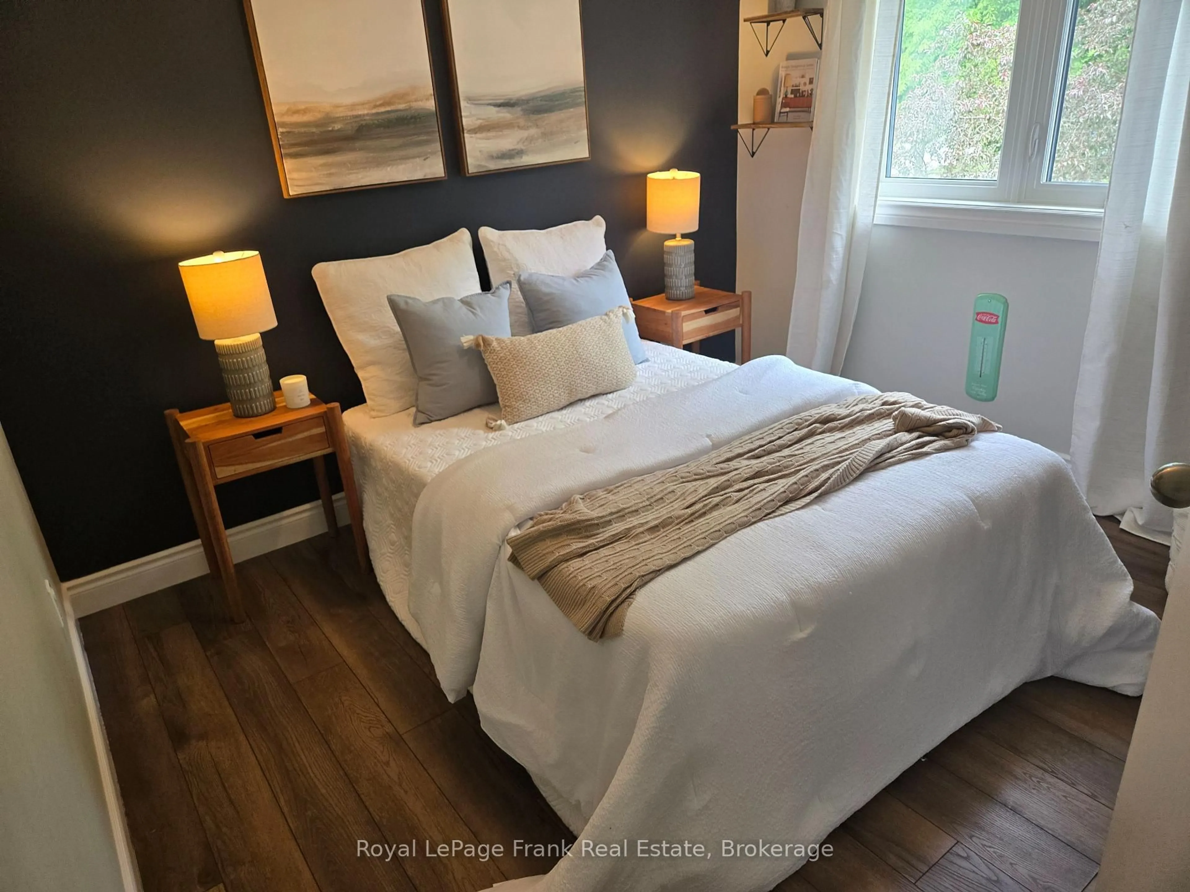Bedroom with bed, wood/laminate floor for 731 Honey Tree Crt, Whitby Ontario L1N 7W5