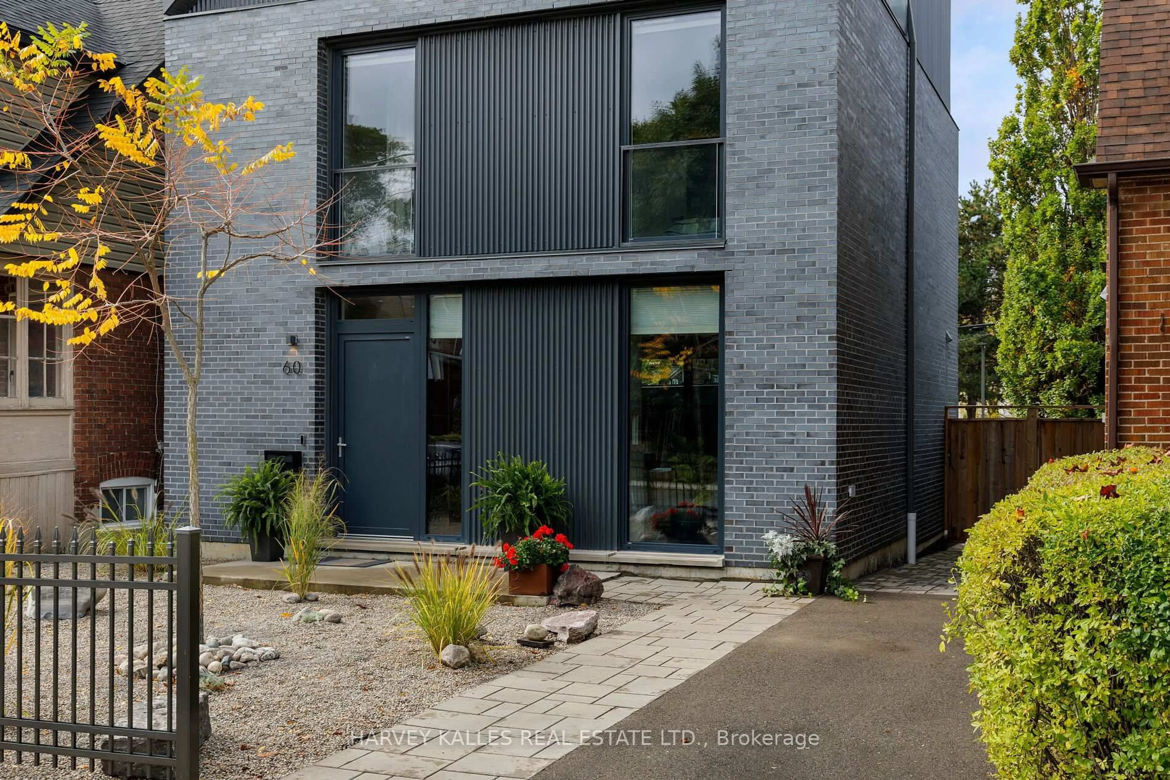 Home with brick exterior material, street for 60 Hiltz Ave, Toronto Ontario M4L 2N5