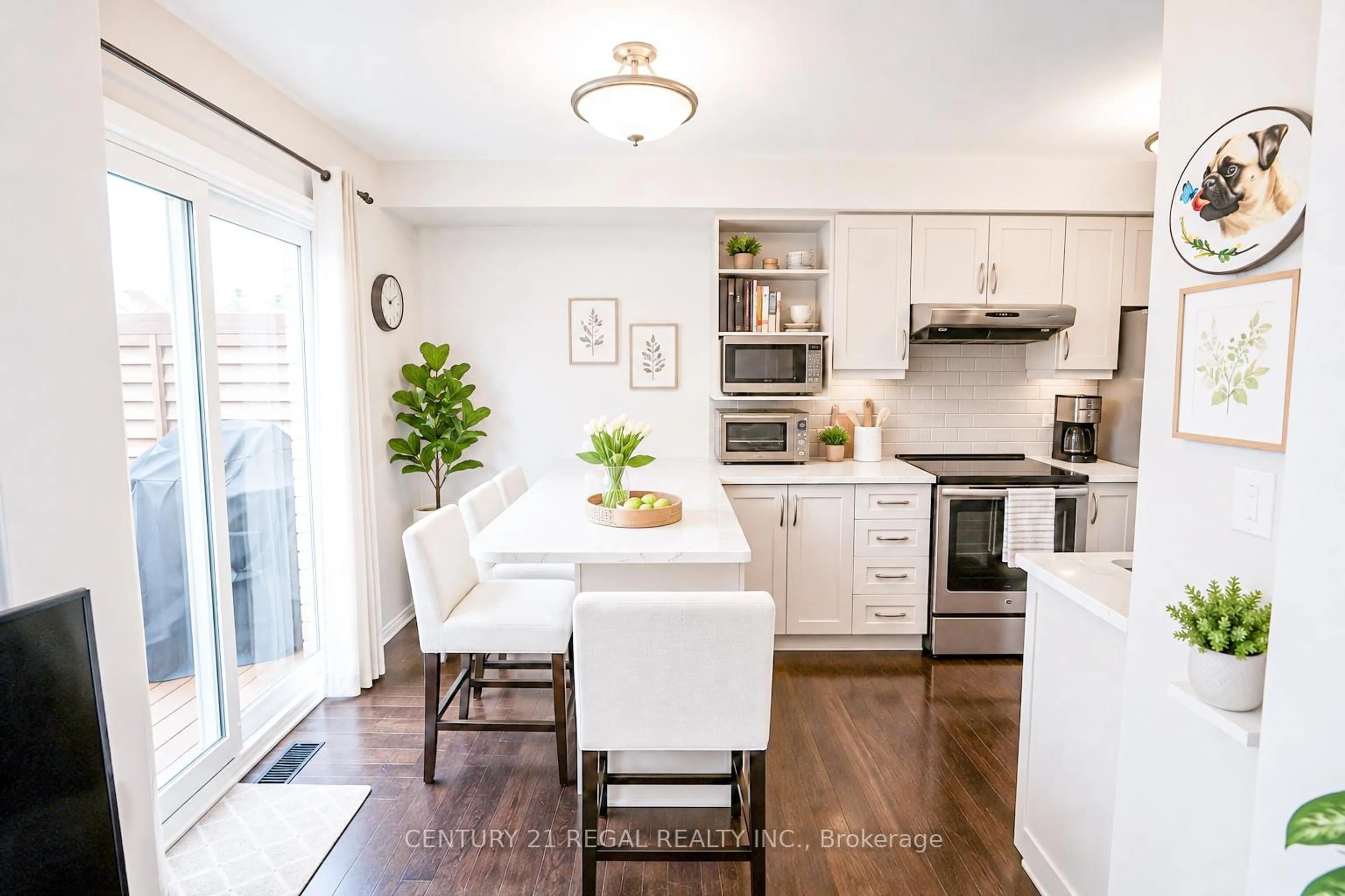 Open concept kitchen, wood/laminate floor for 46 Blacksmith Lane, Whitby Ontario L1P 1N1