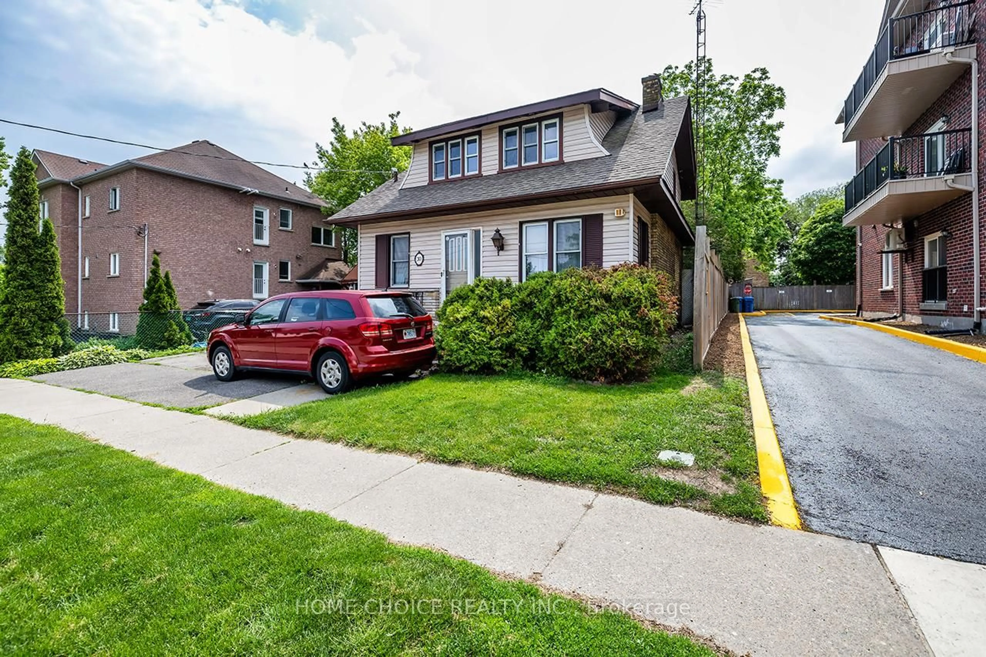 Home with brick exterior material, street for 30 Grenfell St, Oshawa Ontario L1J 4V8
