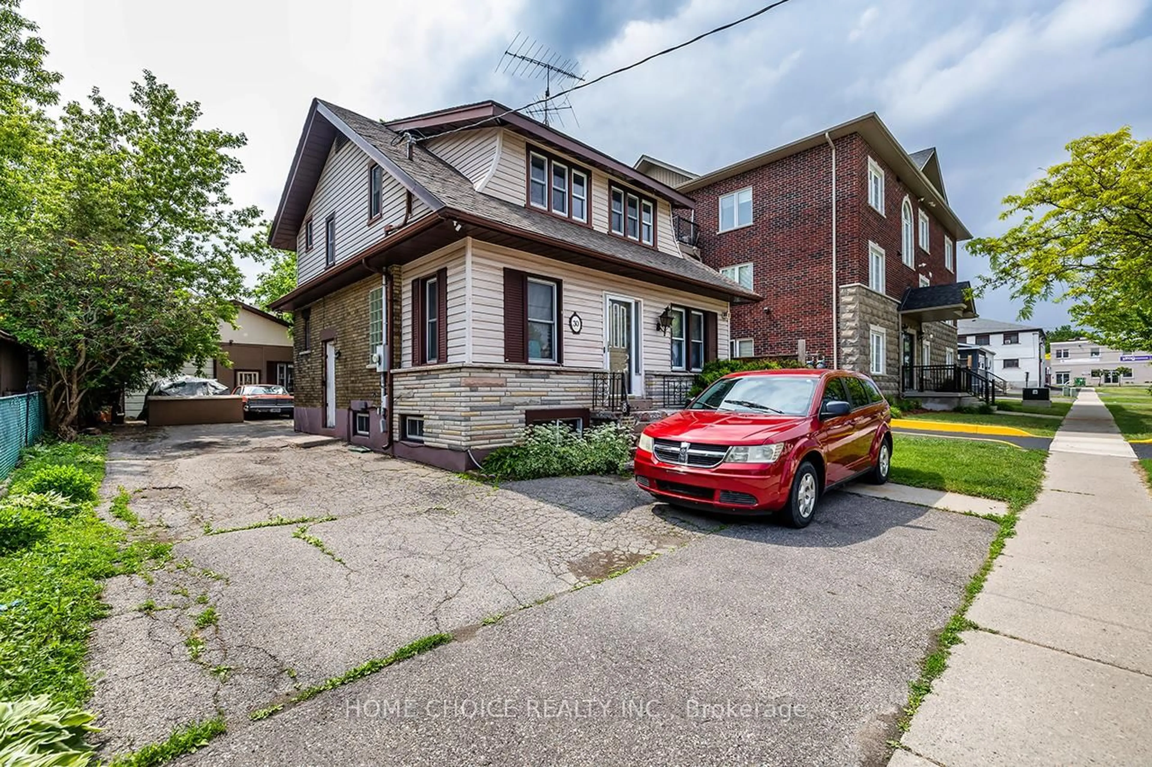 Home with brick exterior material, street for 30 Grenfell St, Oshawa Ontario L1J 4V8