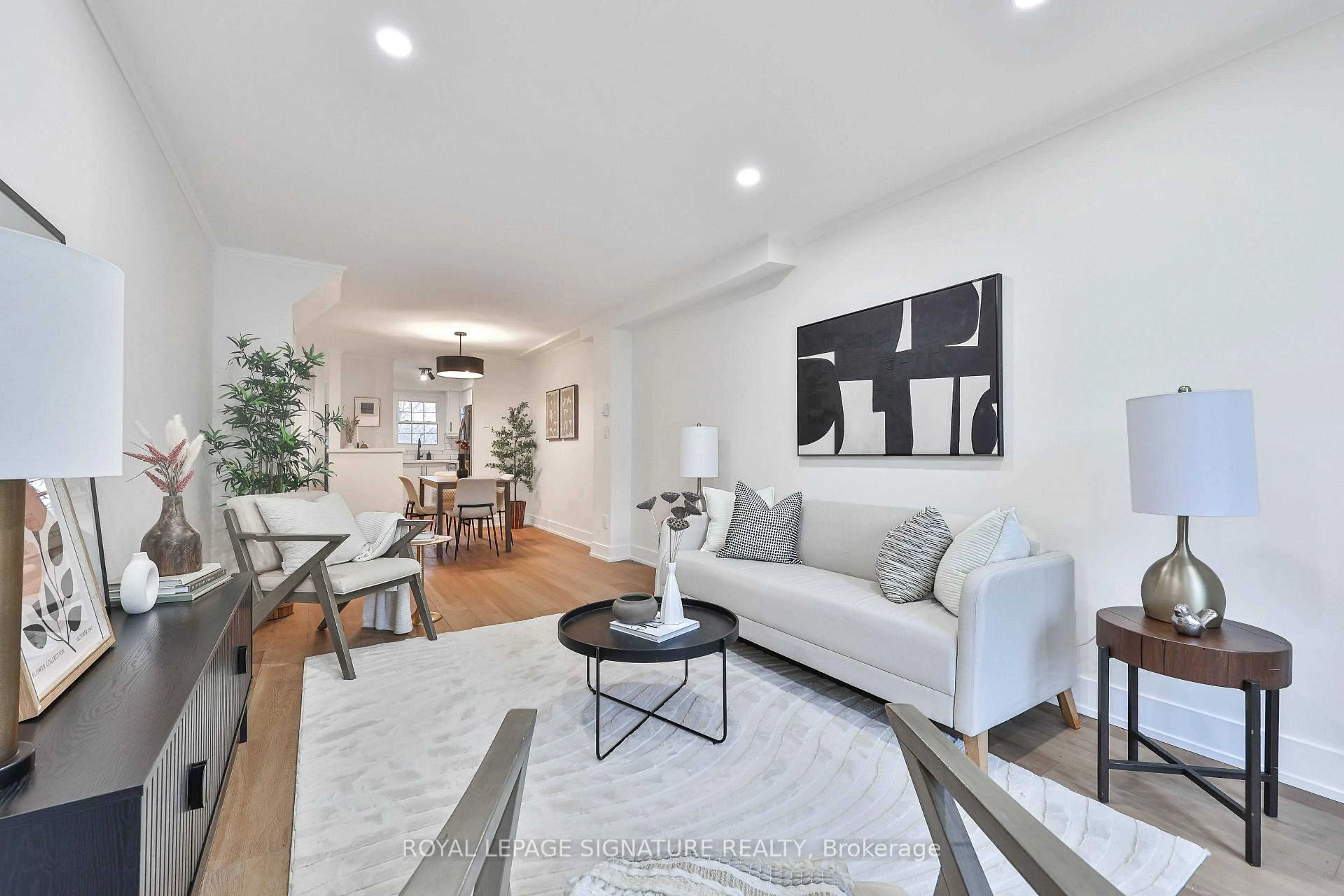 Living room with furniture, wood/laminate floor for 101 Glen Manor Dr #6, Toronto Ontario M4E 3V3