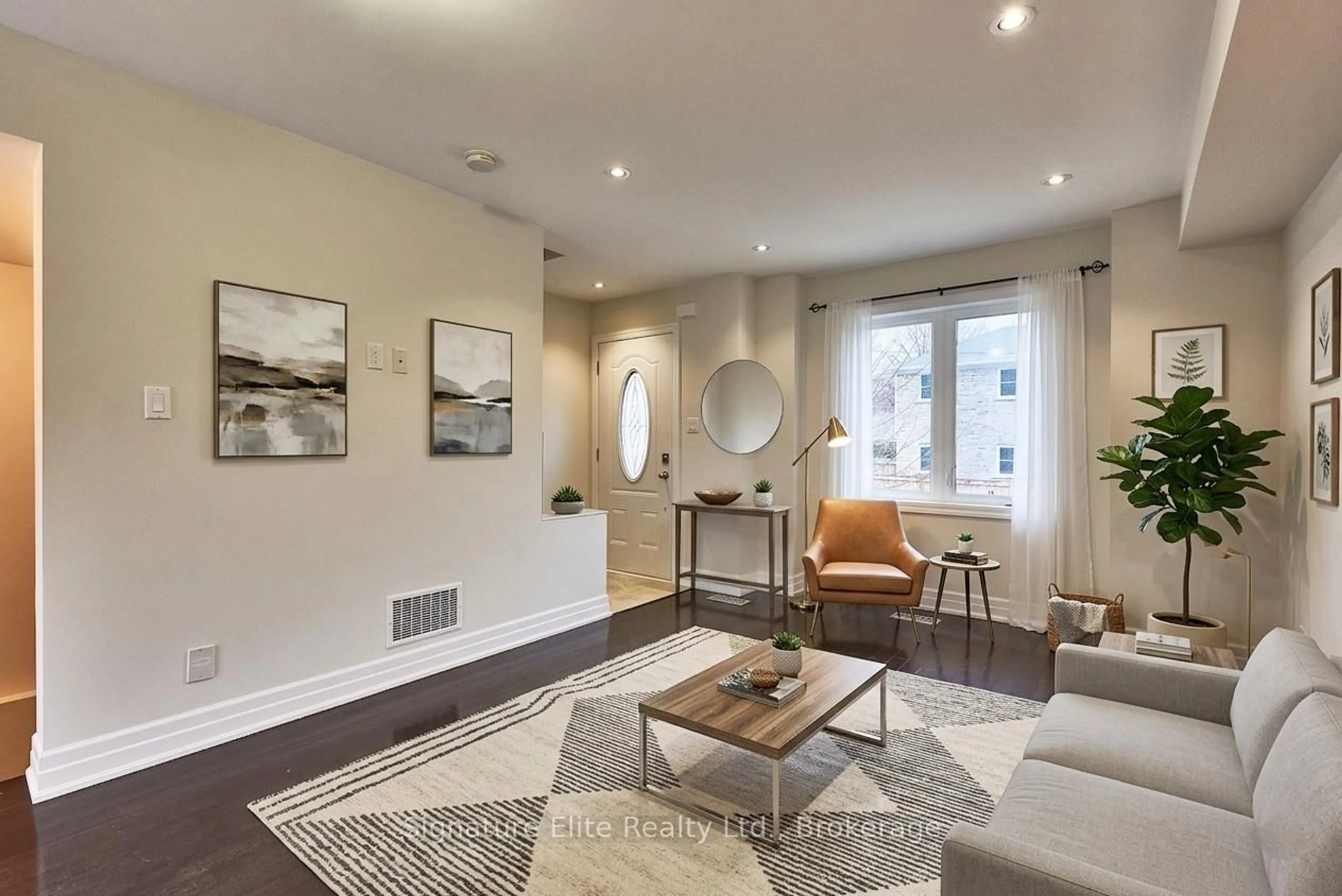 Living room with furniture, wood/laminate floor for 6 Coventry St, Toronto Ontario M1L 0H1