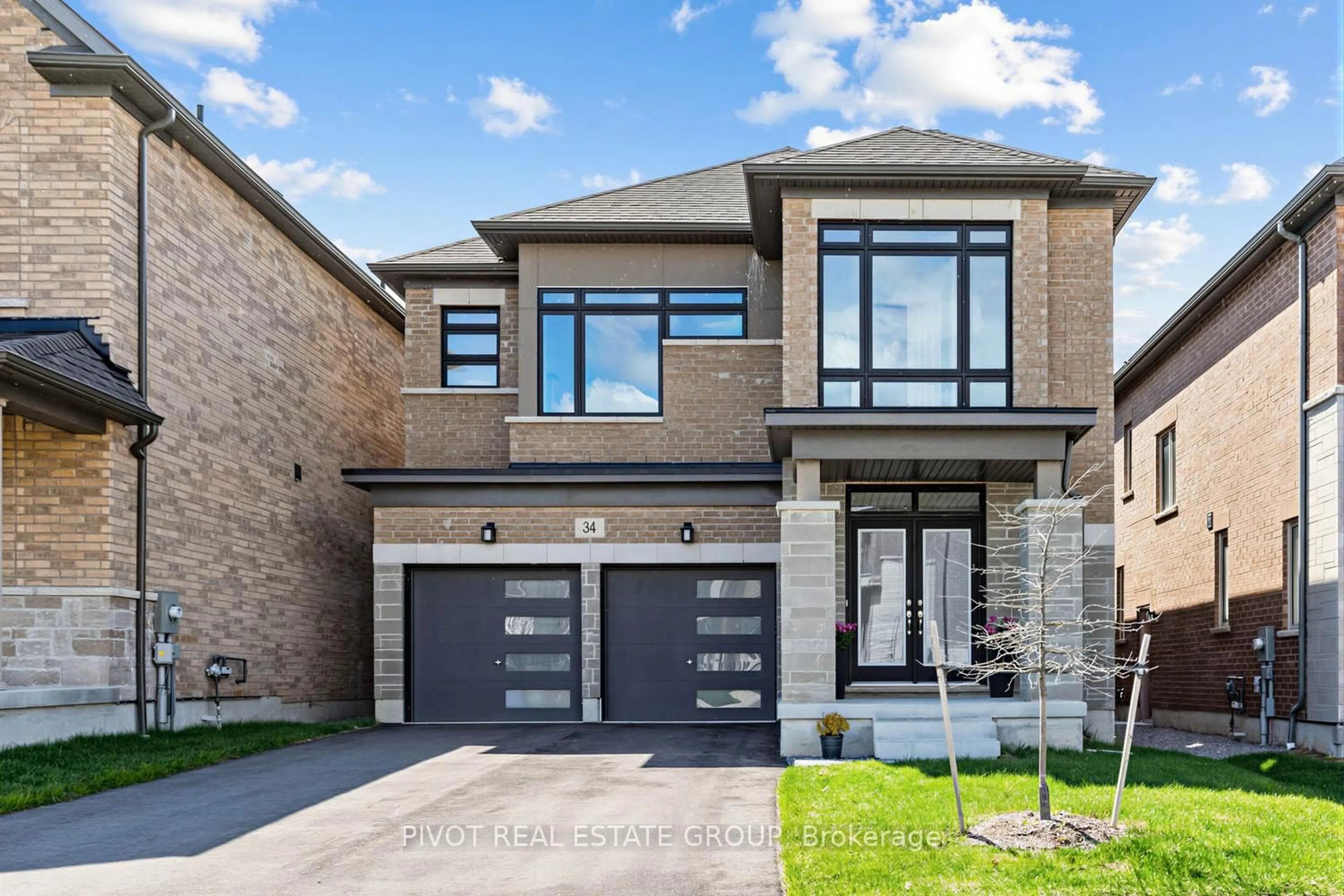 Home with brick exterior material, street for 34 Waterfront Cres, Whitby Ontario L1N 0M9