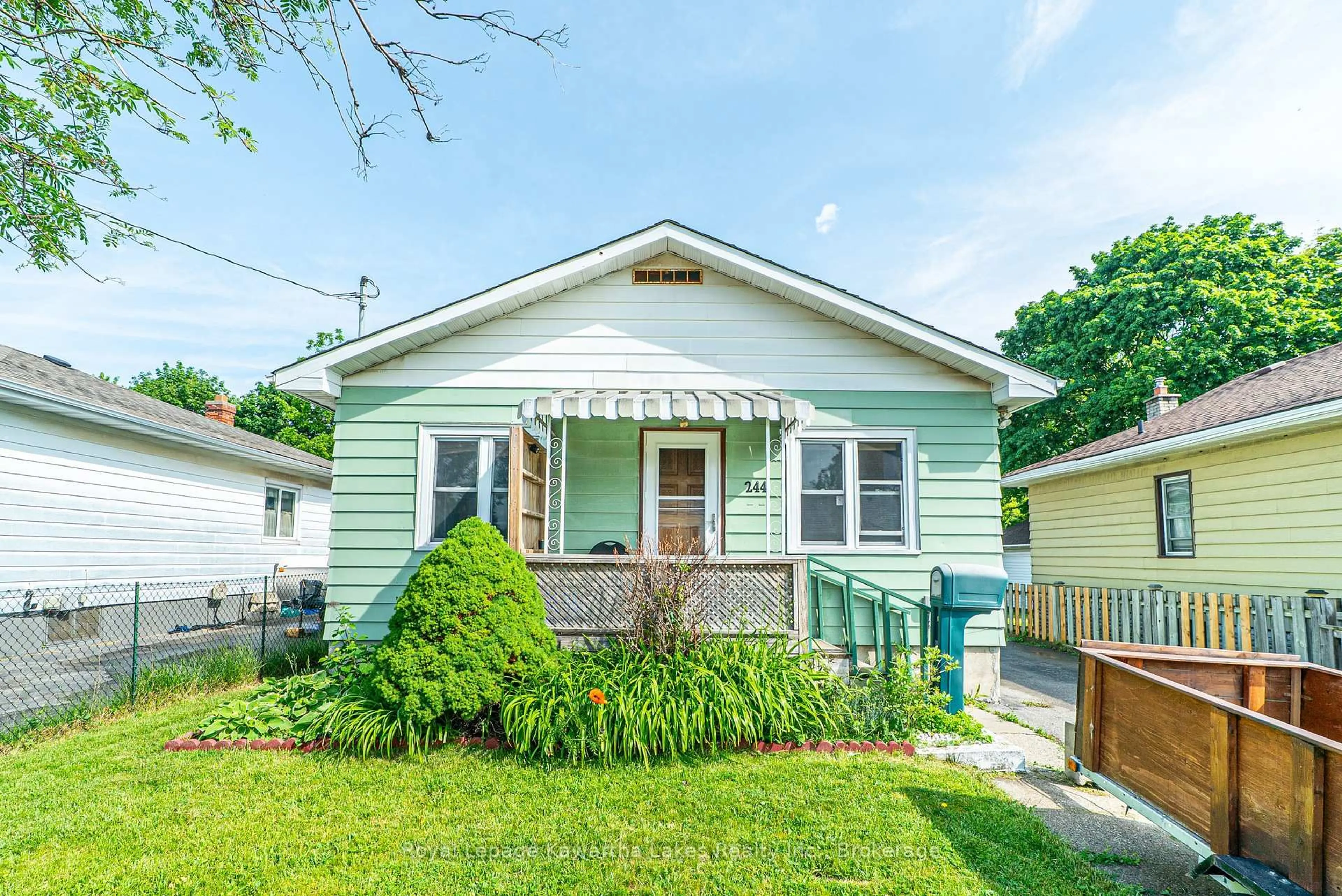 Home with vinyl exterior material, street for 244 Annis St, Oshawa Ontario L1H 3P4
