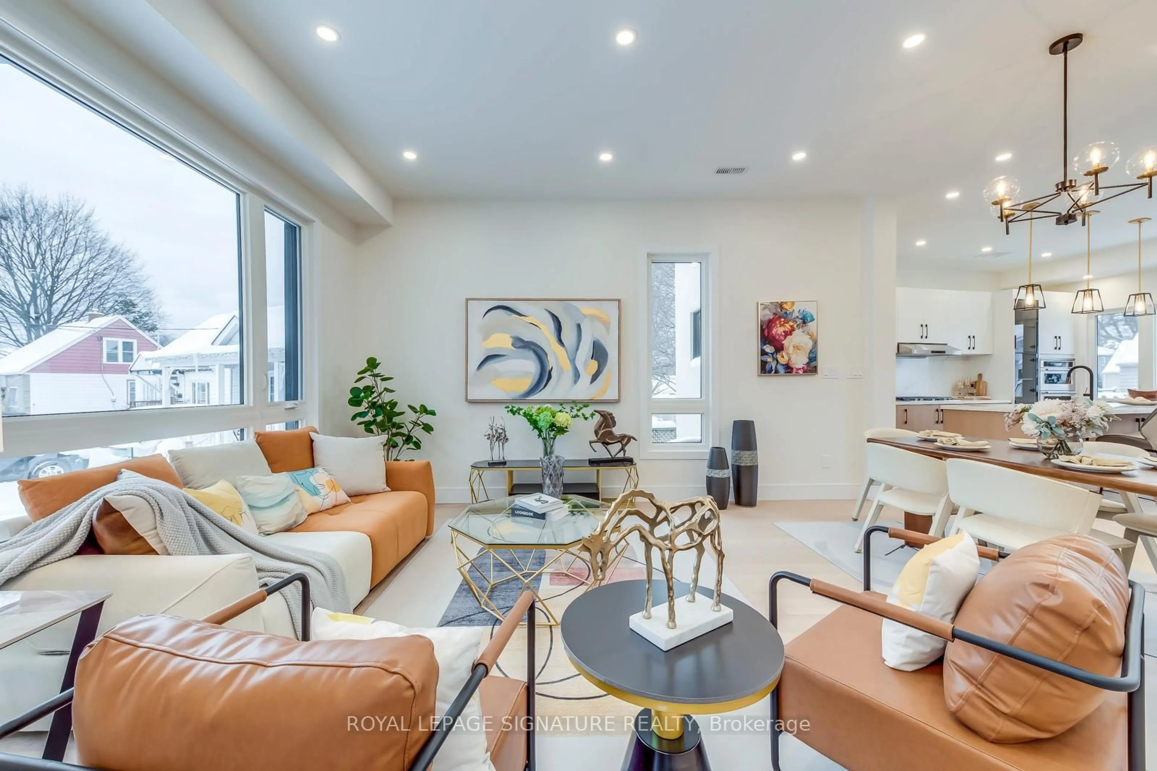 Living room with furniture, ceramic/tile floor for 24 Merritt Rd, Toronto Ontario M4B 3K5