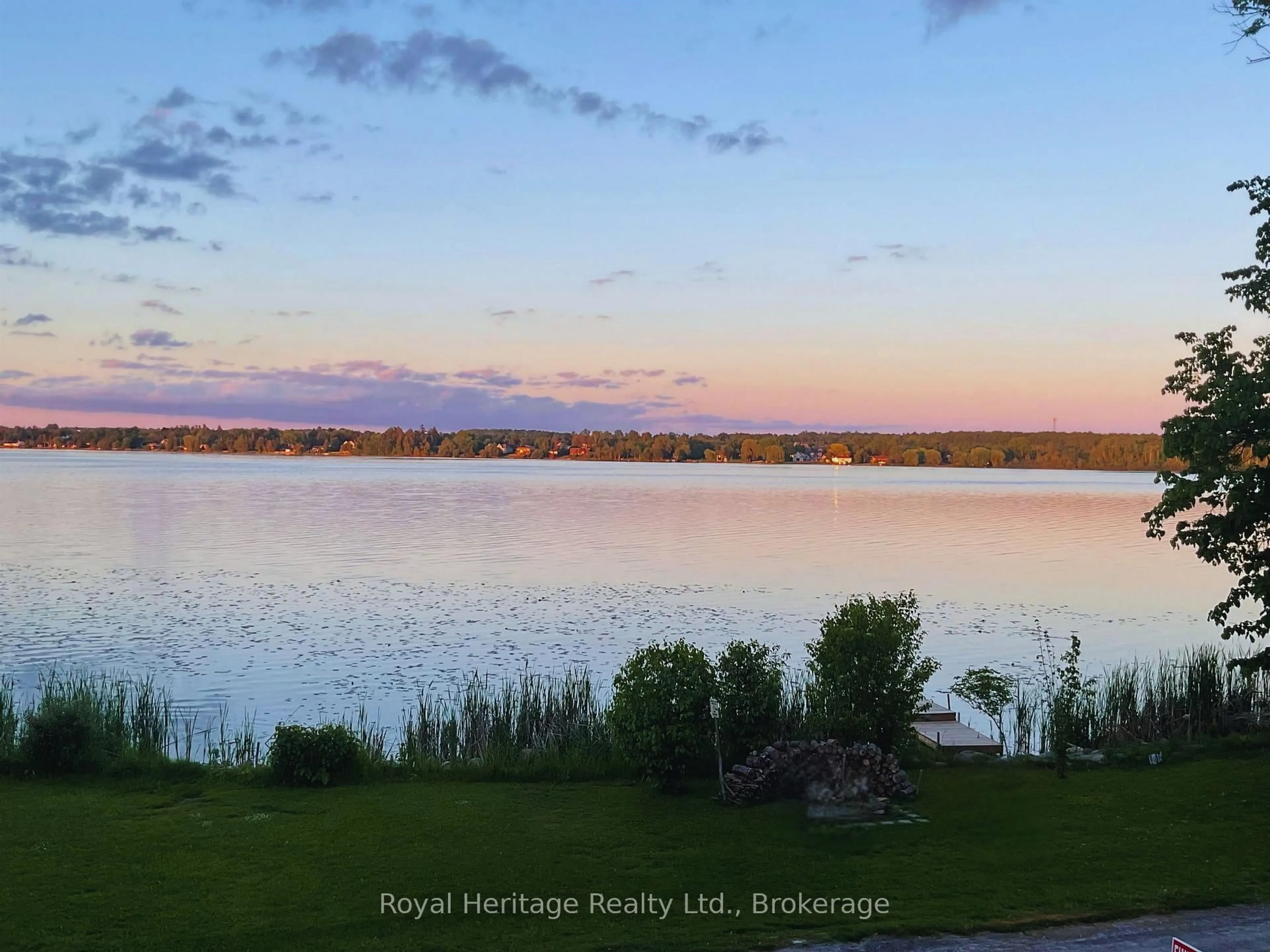 A pic from outside/outdoor area/front of a property/back of a property/a pic from drone, water/lake/river/ocean view for 56 Pine Point Lane, Scugog Ontario L9L 1B4