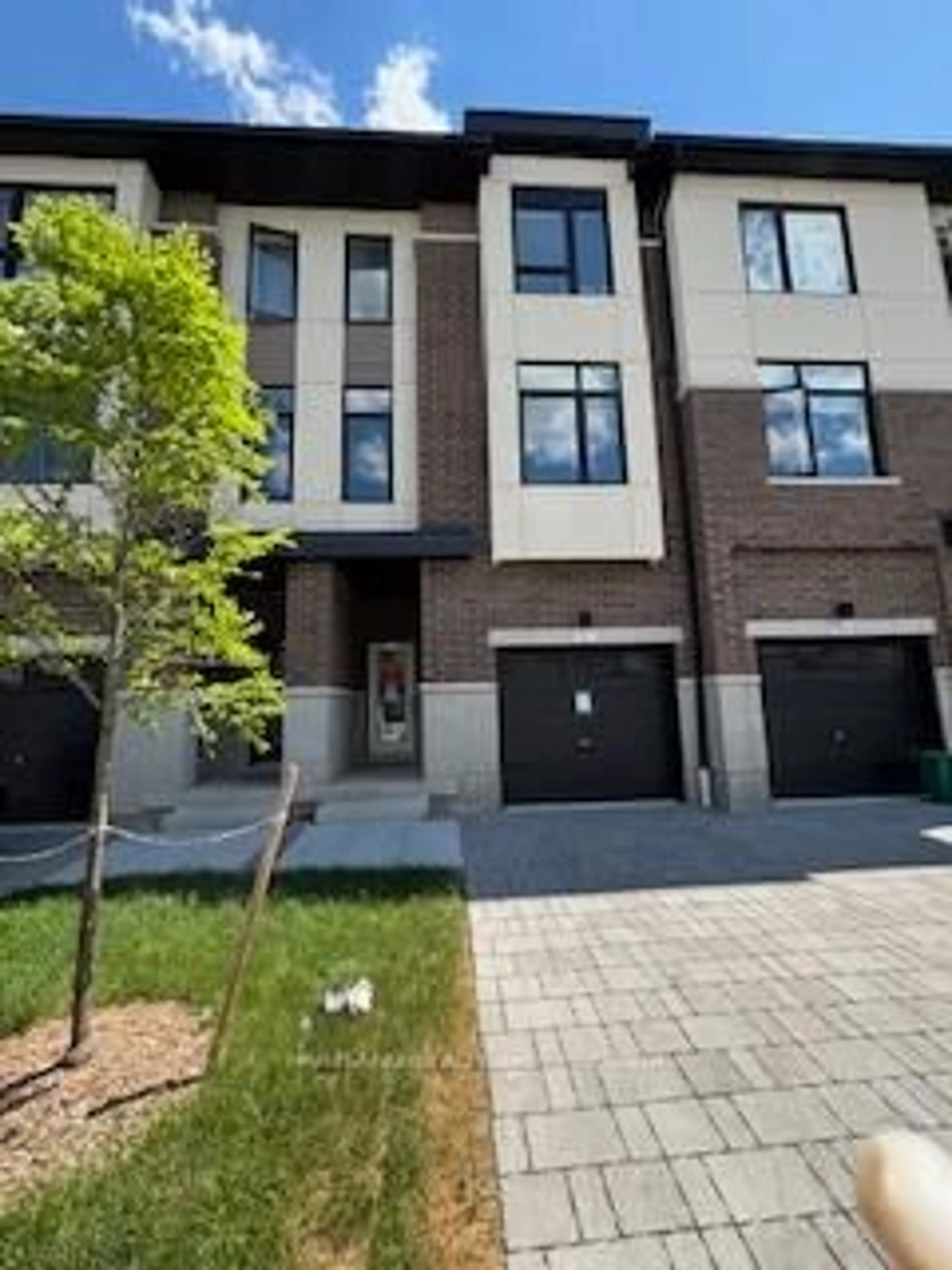 Home with brick exterior material, street for 1695 Dersan St #407, Pickering Ontario L1X 0S9