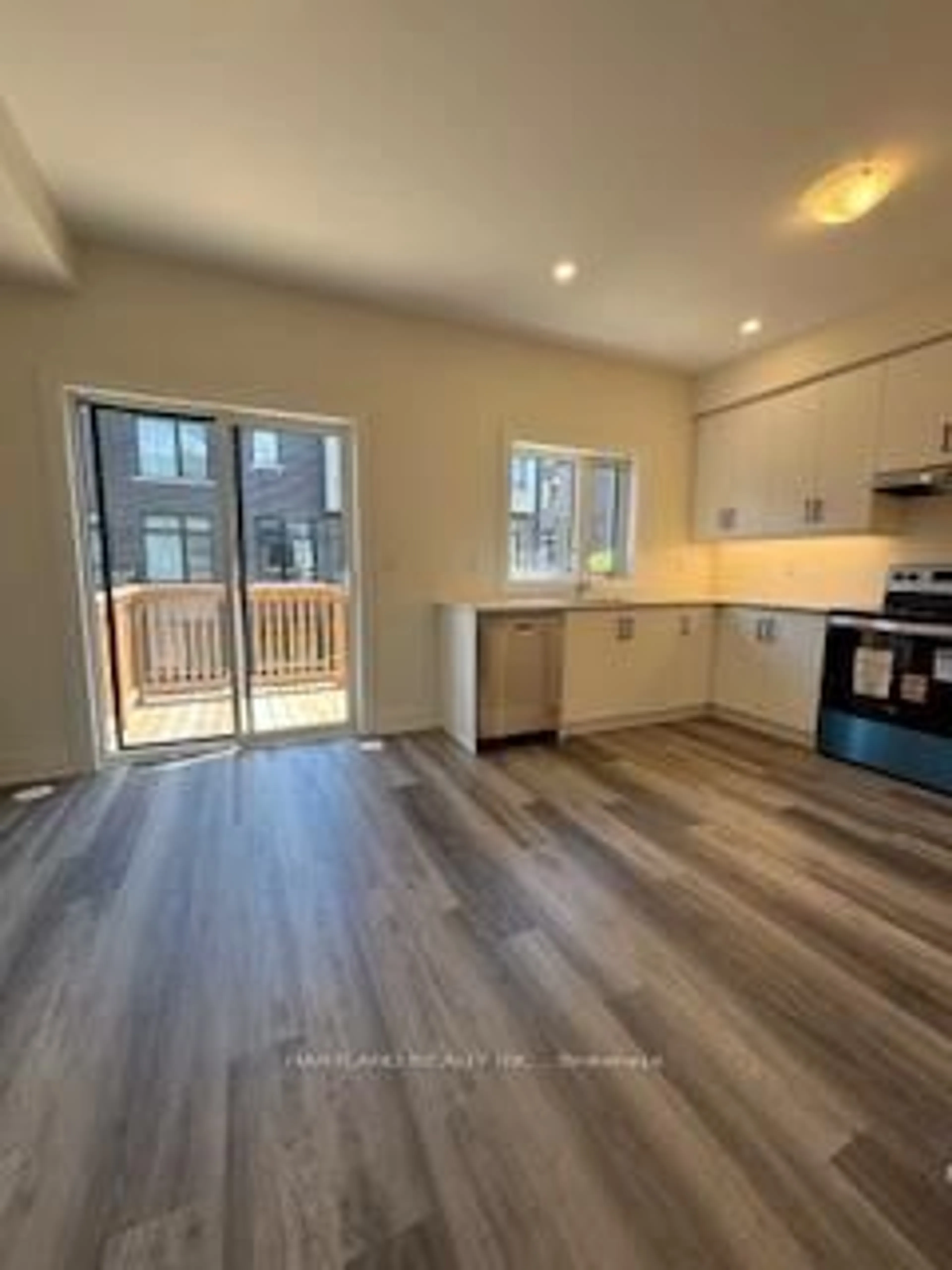 Open concept kitchen, wood/laminate floor for 1695 Dersan St #407, Pickering Ontario L1X 0S9